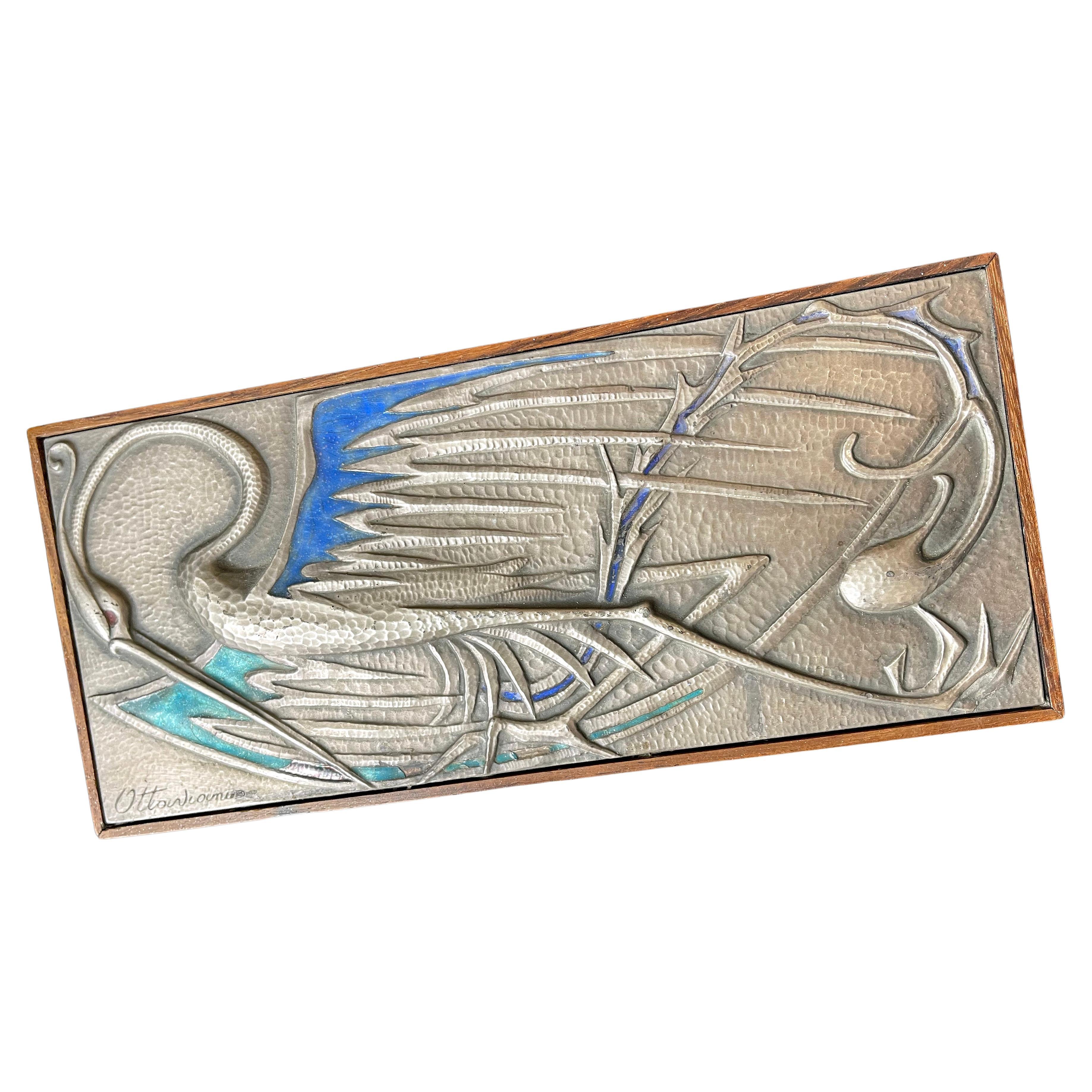 Beautifully crafted of hammered silver -- now with a soft, old silver patina -- enamel and rosewood, this exceptional decorative box depicts a wildly imaginative crane-like bird with blue and green plumage, its wings outspread and its long, narrow