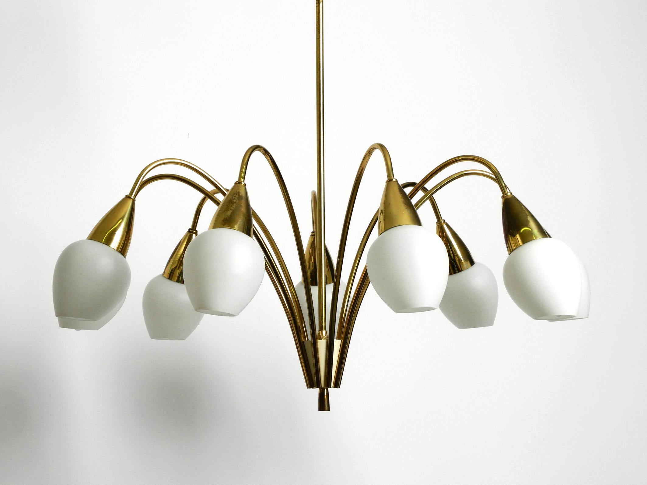 Fantastically 9-armed large mid-century brass chandelier with opal glass shades For Sale 11
