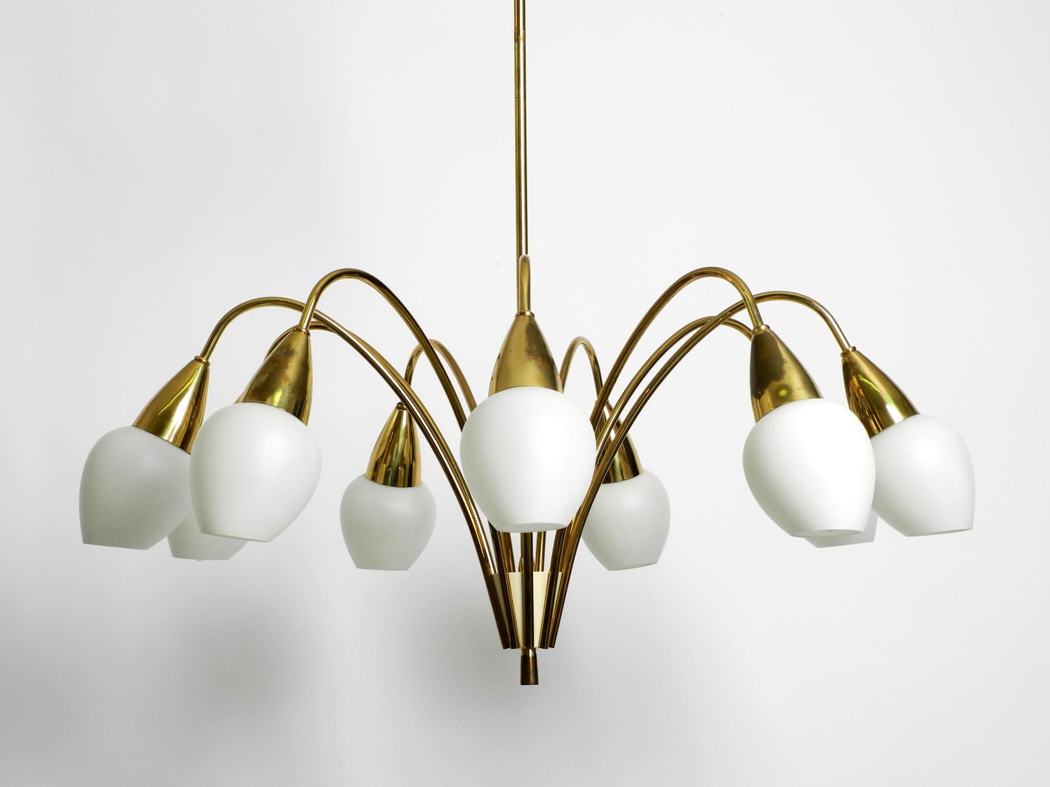 Fantastically 9-armed large mid-century brass chandelier with opal glass shades For Sale 12