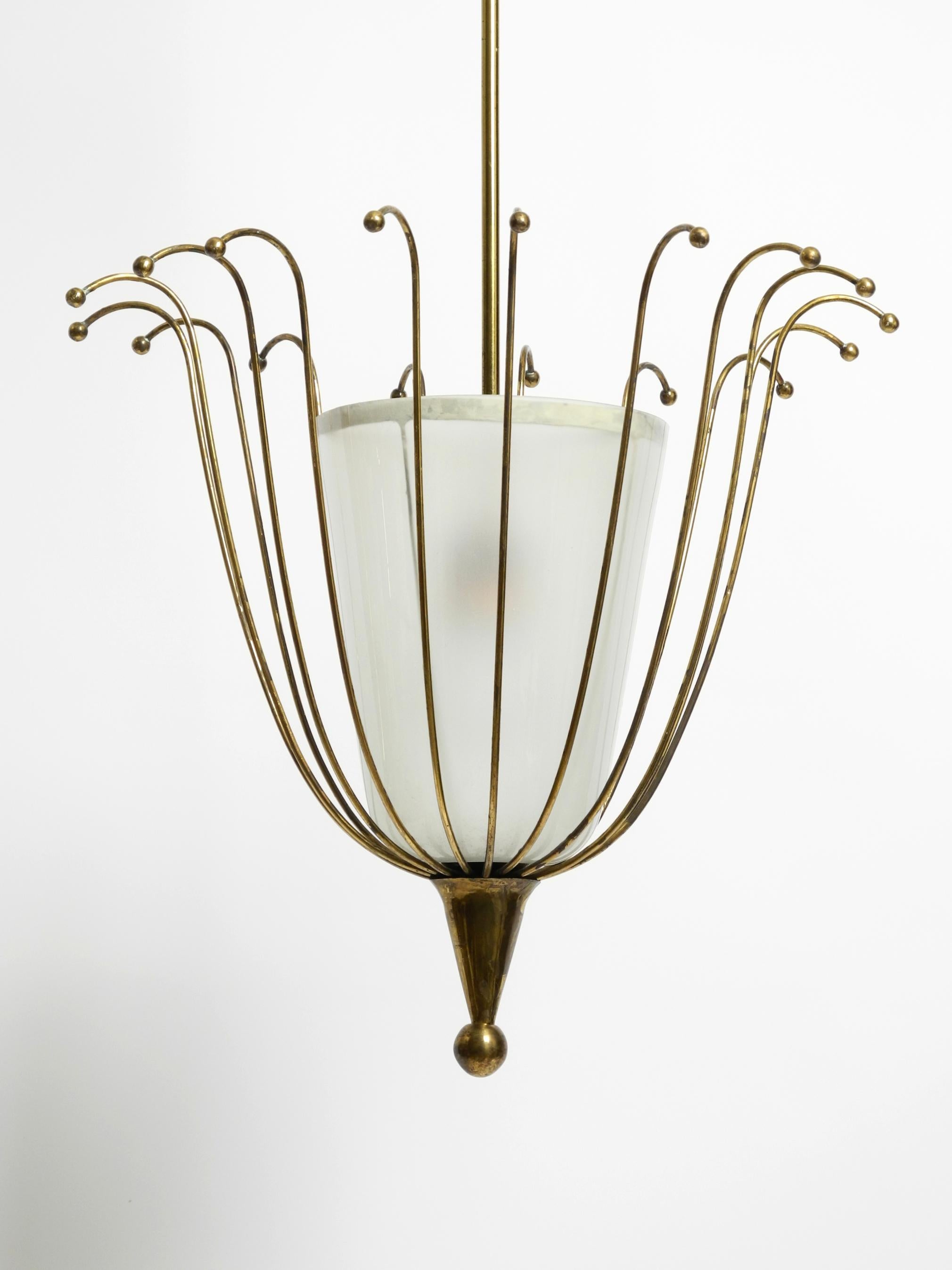 Fantastically Italian Mid Century ceiling lamp made of brass and glass shade 4