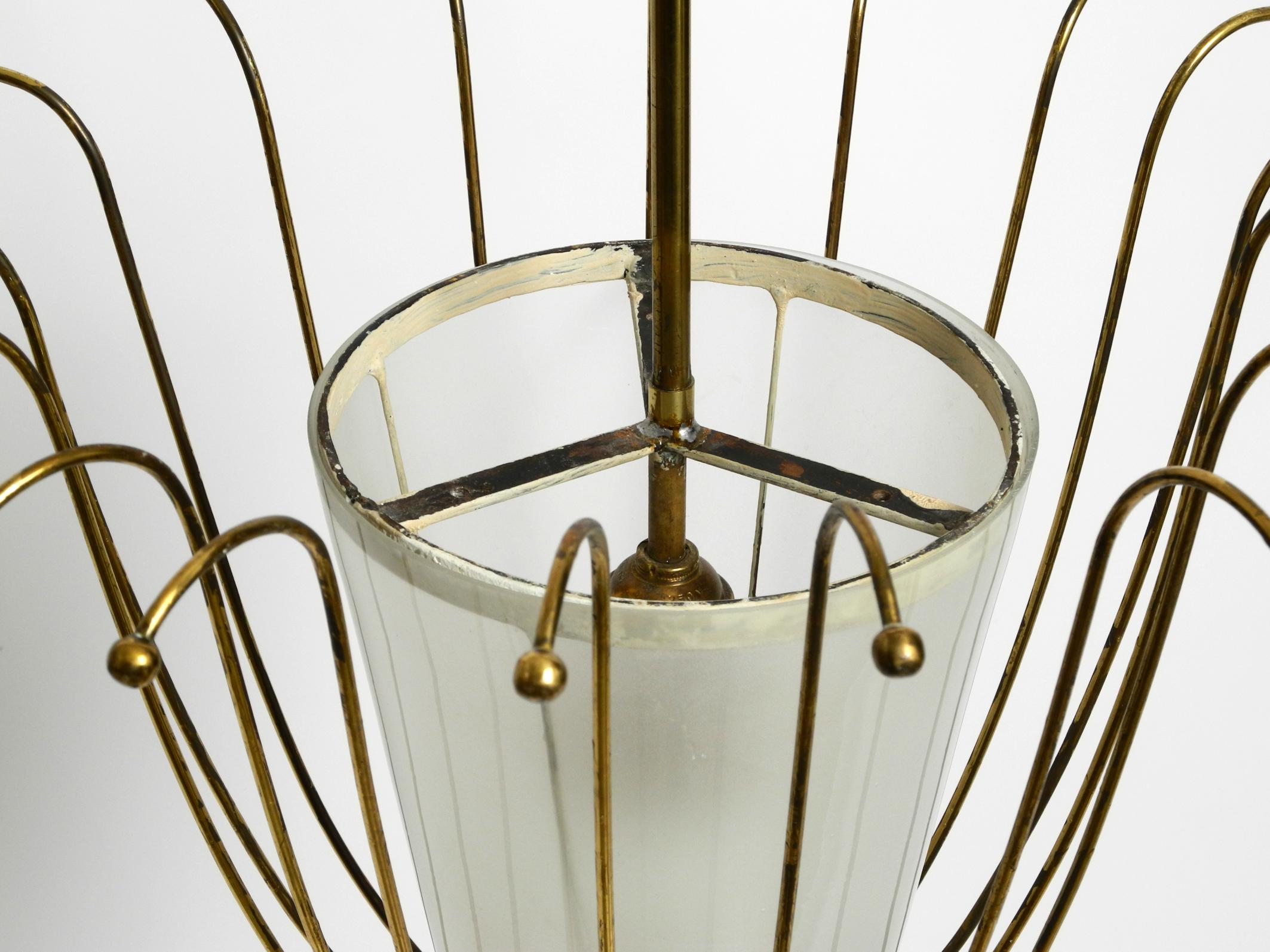 Fantastically Italian Mid Century ceiling lamp made of brass and glass shade 5