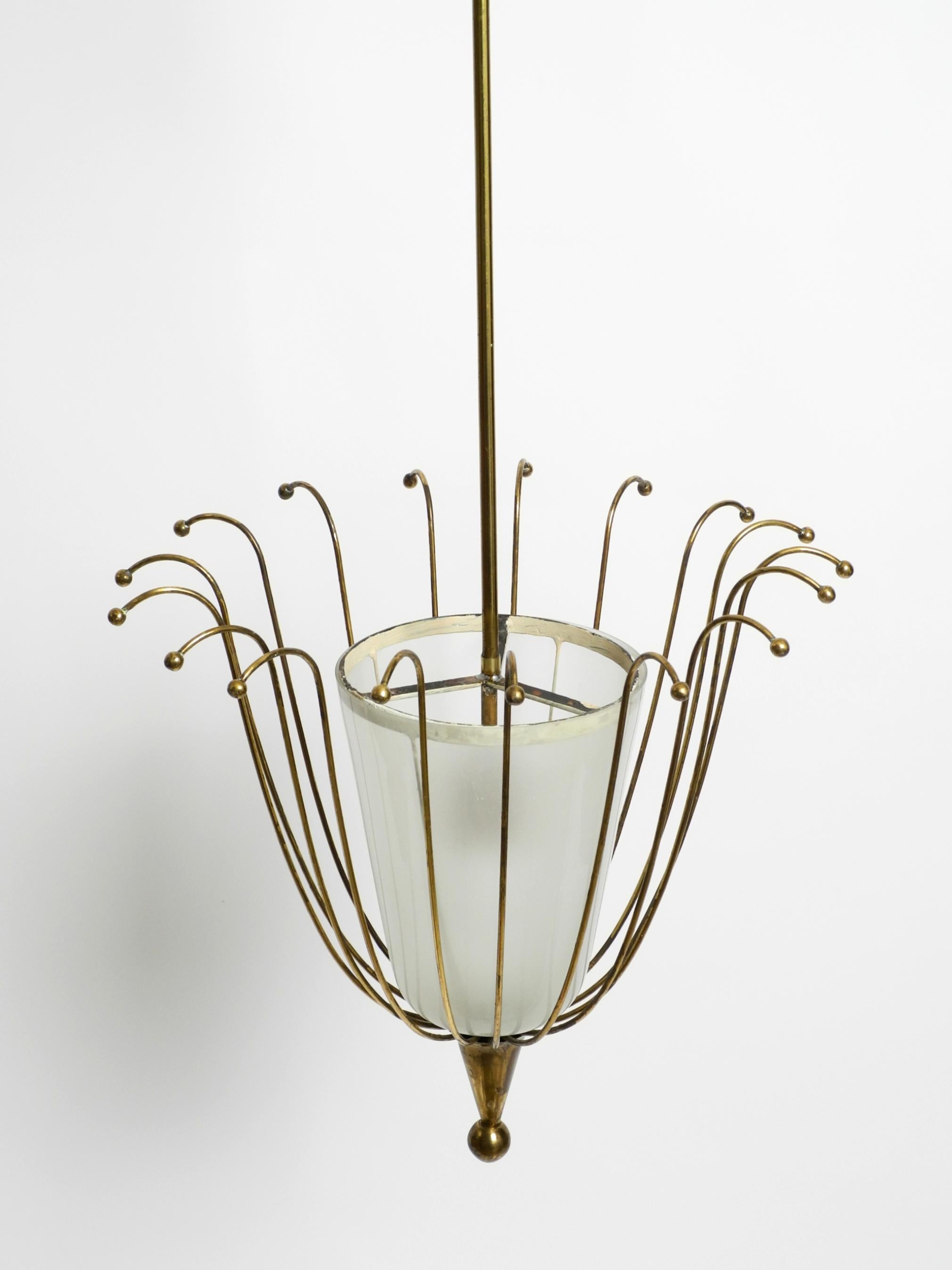 Fantastically Italian Mid Century ceiling lamp made of brass and glass shade 7