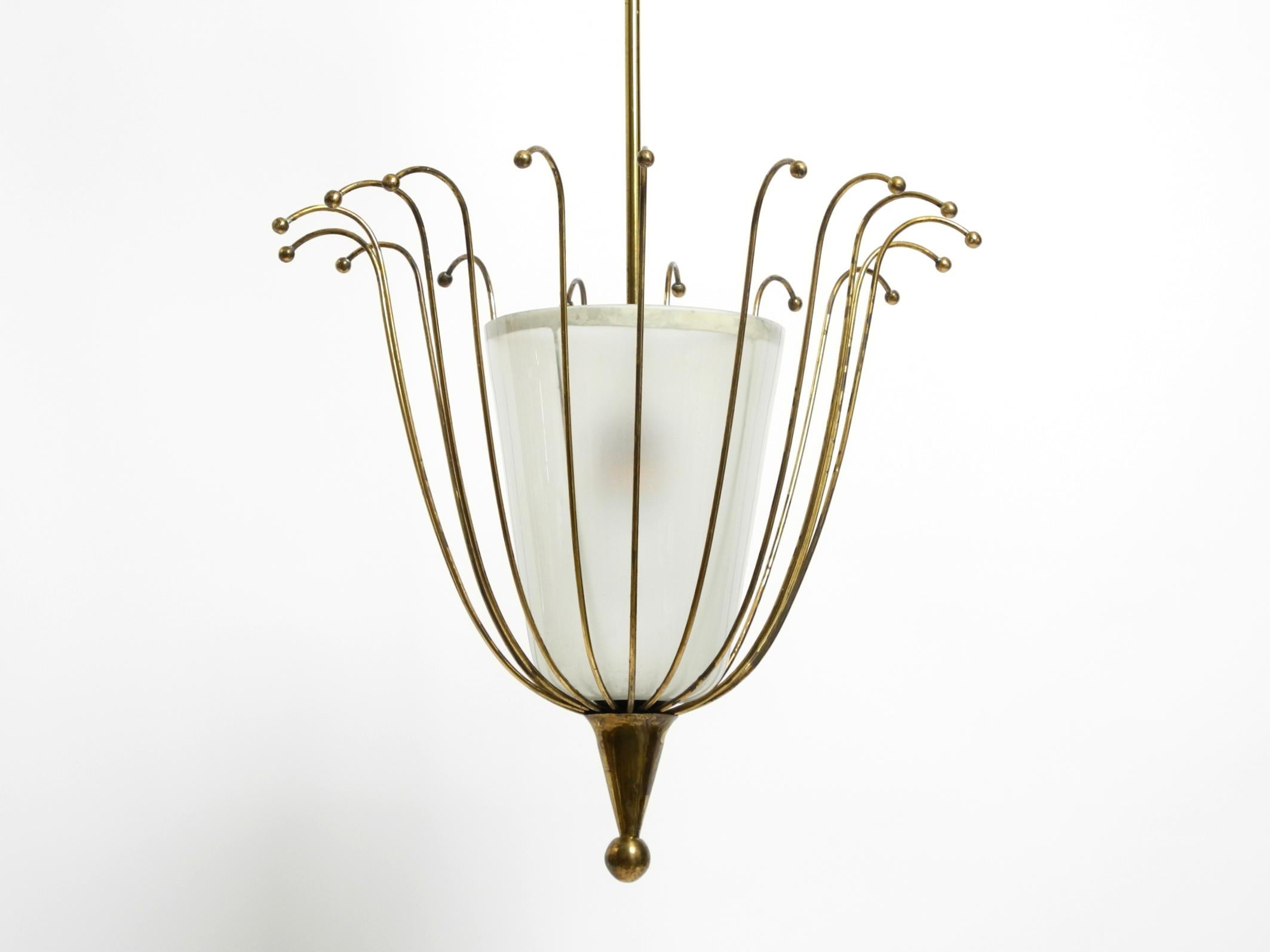 Fantastically Italian Mid Century ceiling lamp made of brass and glass shade 8