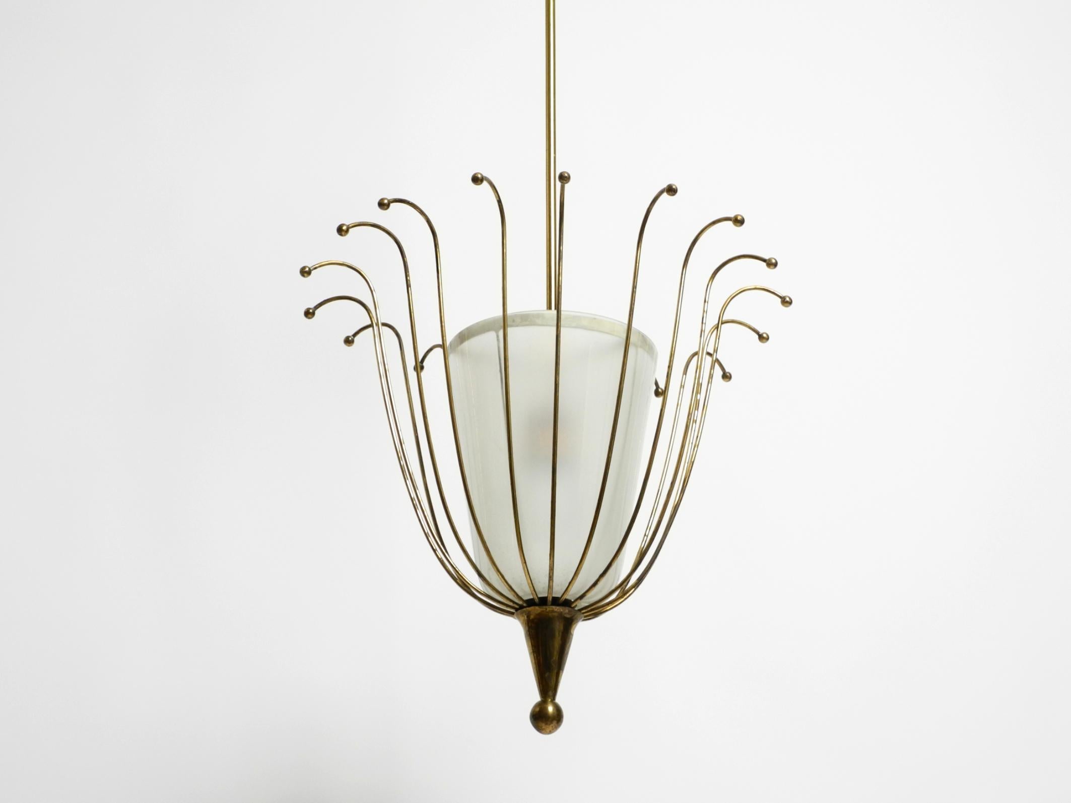 Fantastically Italian Mid Century ceiling lamp made of brass and glass shade 9