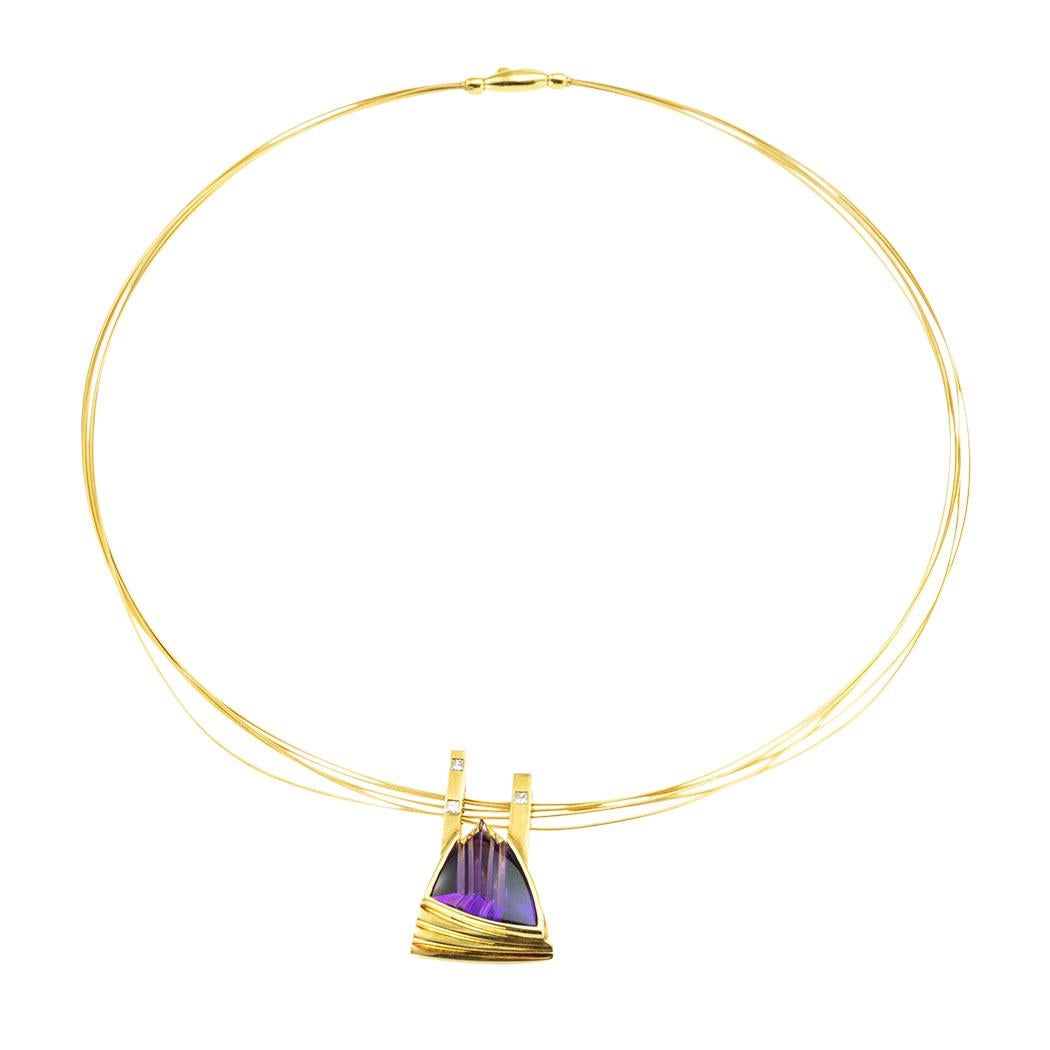 Fantasy-cut amethyst and princess-cut diamonds yellow gold necklace circa 2000. *

ABOUT THIS ITEM:  #N-DJ920A. Scroll down for specifications.  According to GIA, fantasy-cut gemstones have grooves, optic dishes, and concave facets.  The