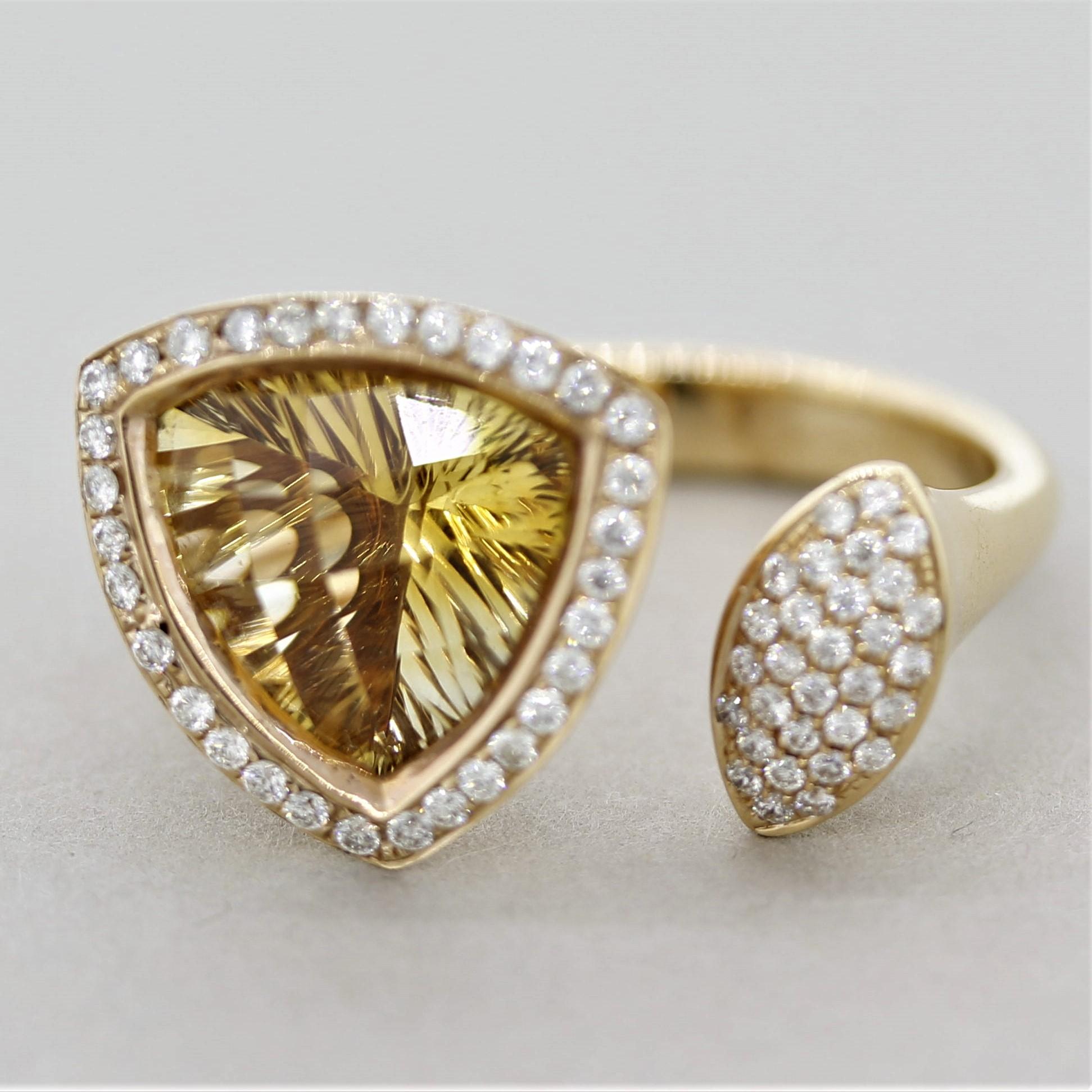 A unique design, this ring features a 3.86 carat trillion-shaped citrine with a stylish fantasy-cut.  Simply put, a fantasy cut is a unique cutting style that puts shape and angled facets on the stone allowing the light to refract in a different