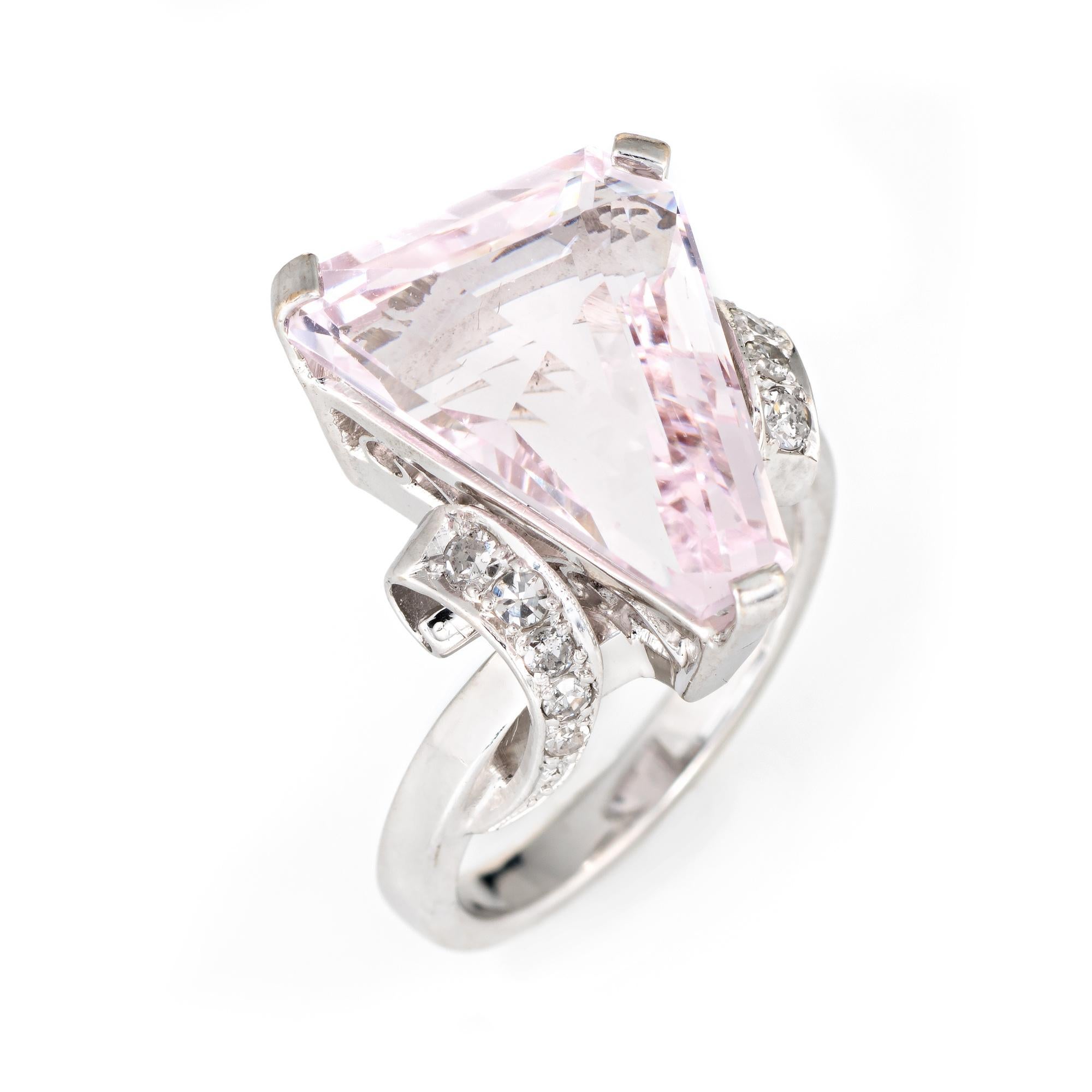 Stylish vintage fantasy cut pink topaz & diamond ring (circa 1980s) crafted in 14 karat white gold. 

Fantasy cut pink topaz measures 16mm x 13mm, accented with 10 single cut diamonds. The total diamond weight is estimated at 0.15 carats (estimated