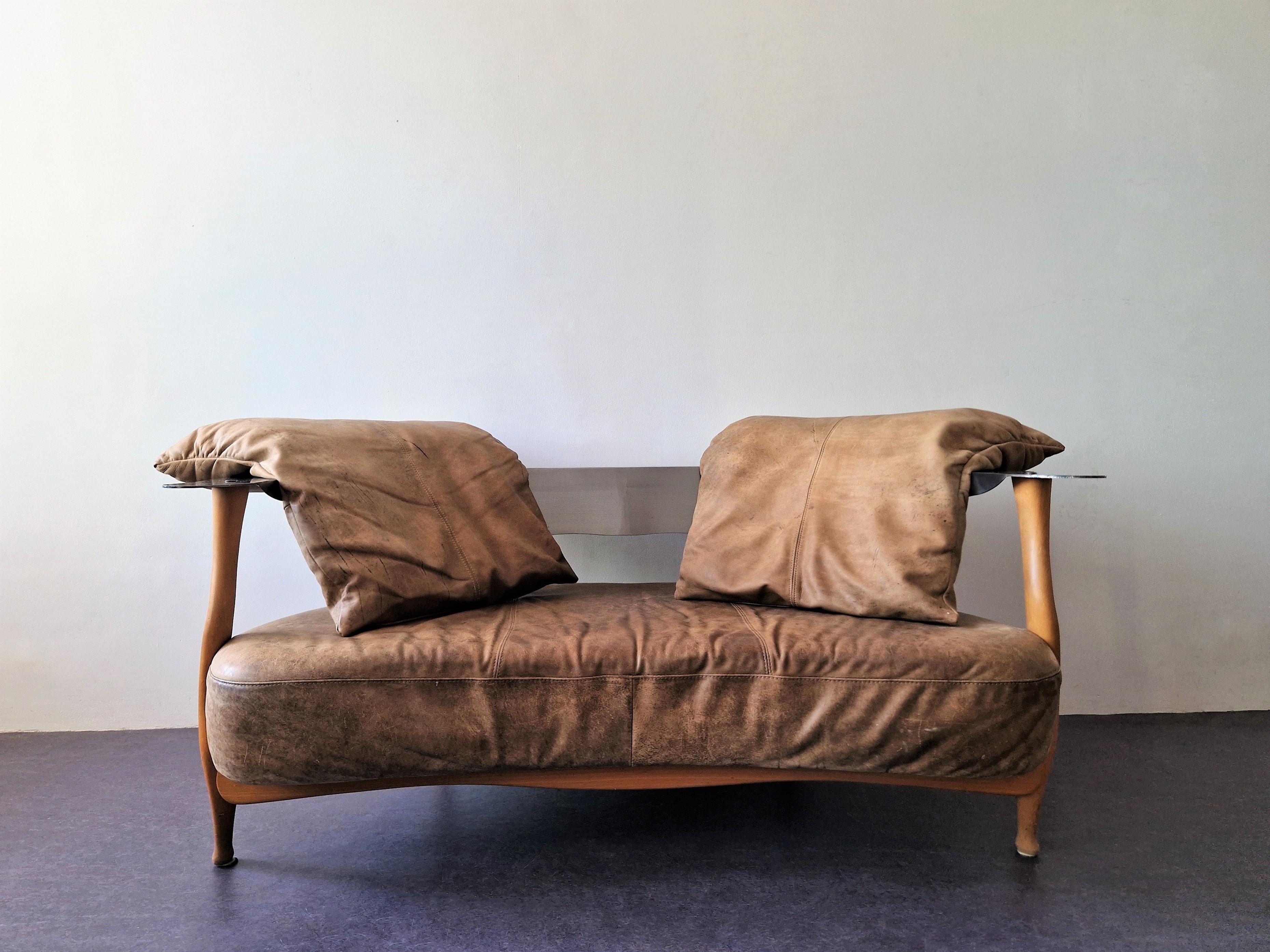 This sculptural 2-seater sofa was designed by the German designer Kurt Beier. It is part of the 'Fantasy Island' collection and has the model name 
