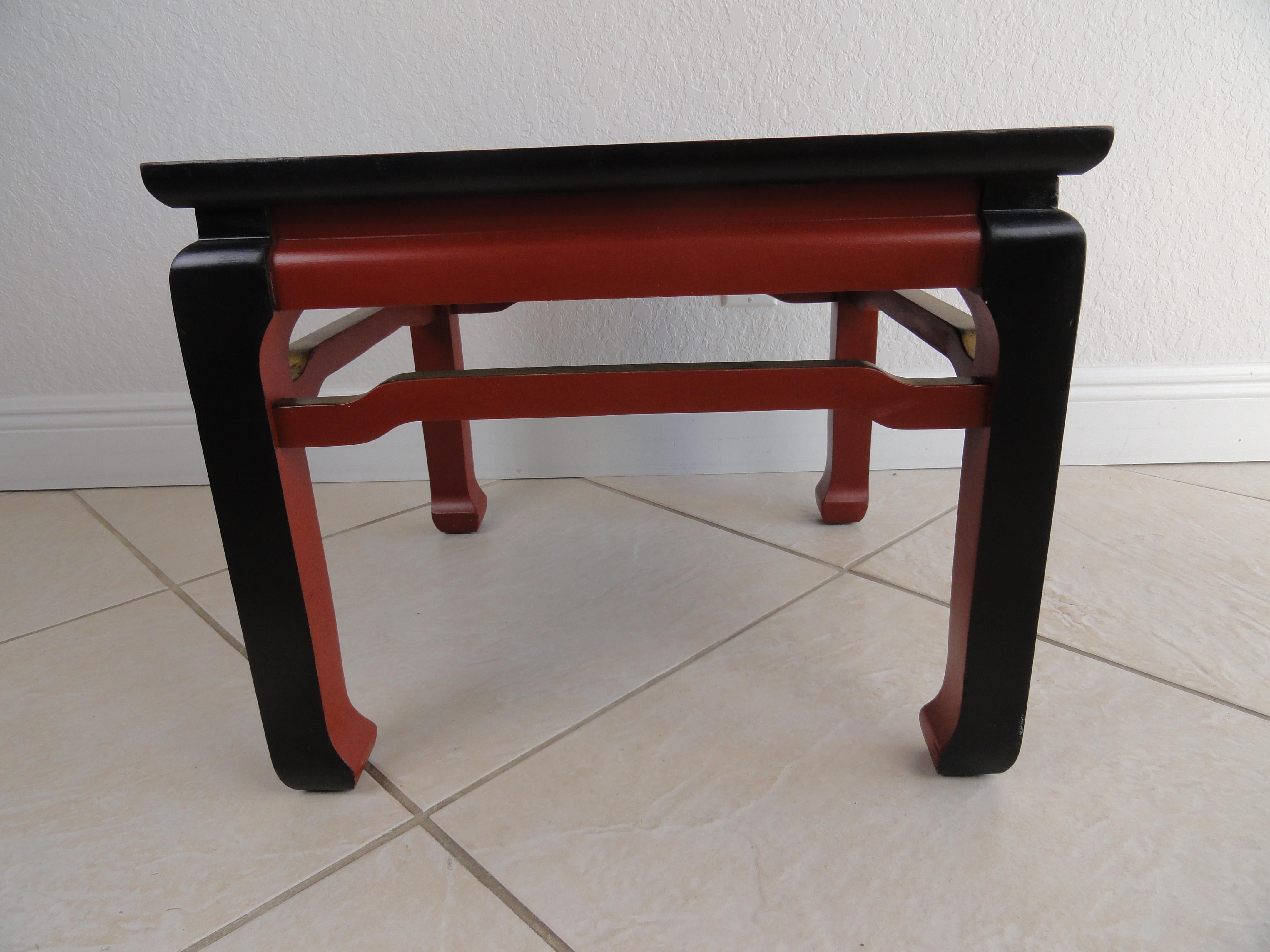 Painted Ming-style table. Painted in black, red and gold-leaf on top, 20th century.