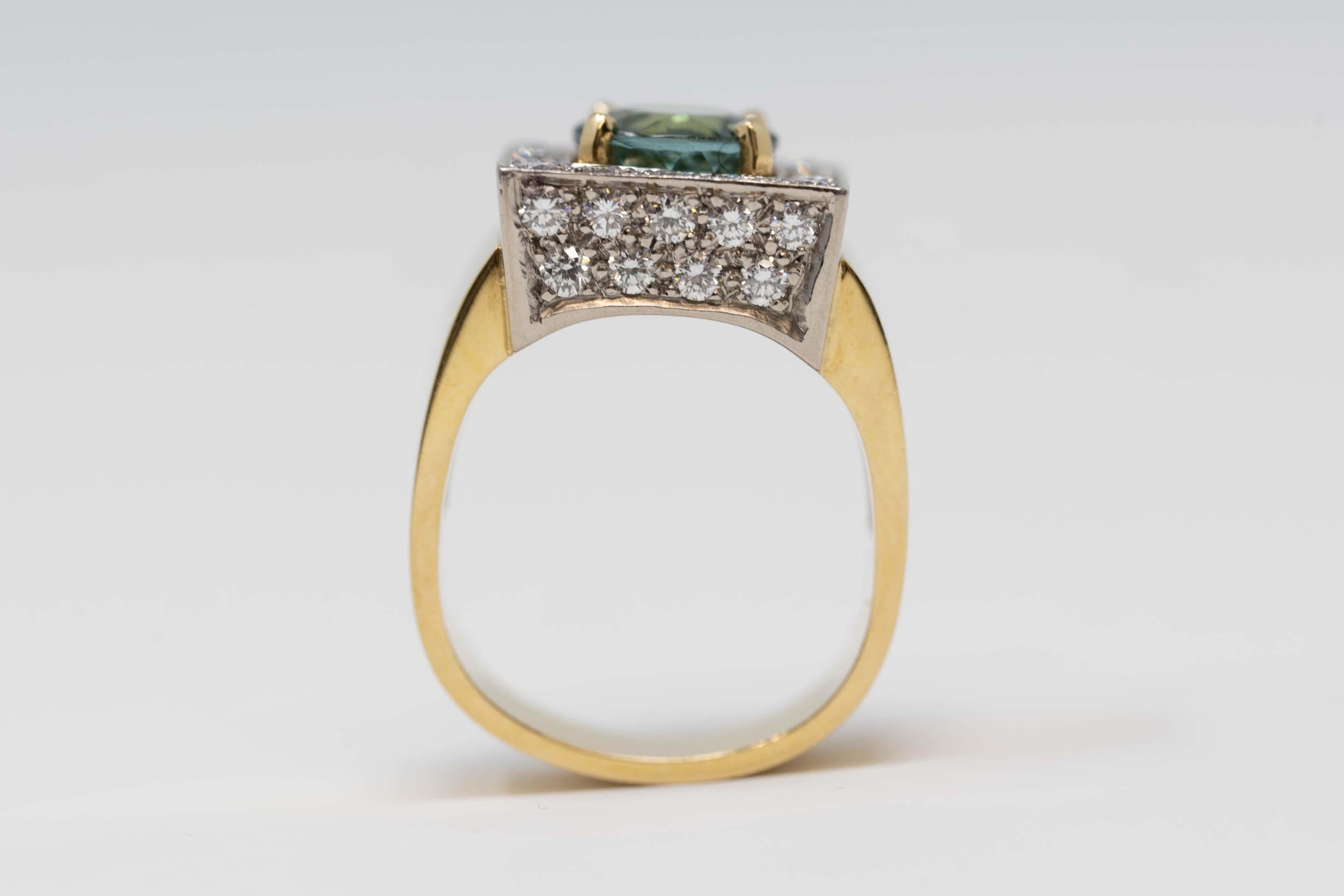 One (1) ladies ring in yellow and white 18 karat gold (stamped), fantasy style, polished finish, total weight 13.6 grams.  The ring is set with thirty-four (34) round brilliant cut diamonds, average weight 0.03 carat each, total weight: 1.00 carat.