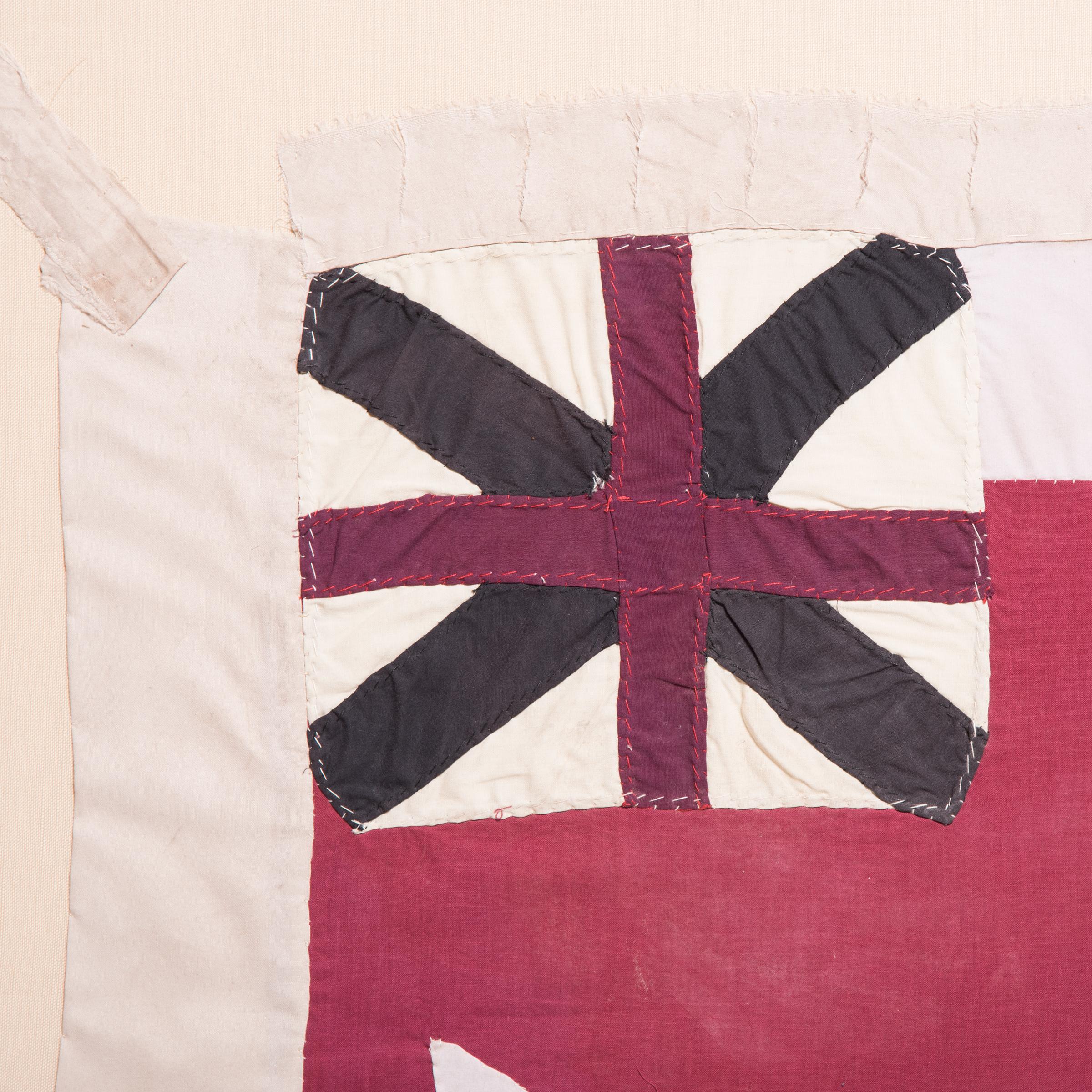 Displayed at festivals and ceremonies, this vibrant flag was created by the Fante People of Ghana to represent a particular military company. These groups, known as Asafo, can be found in villages and large towns, exercising political influence and