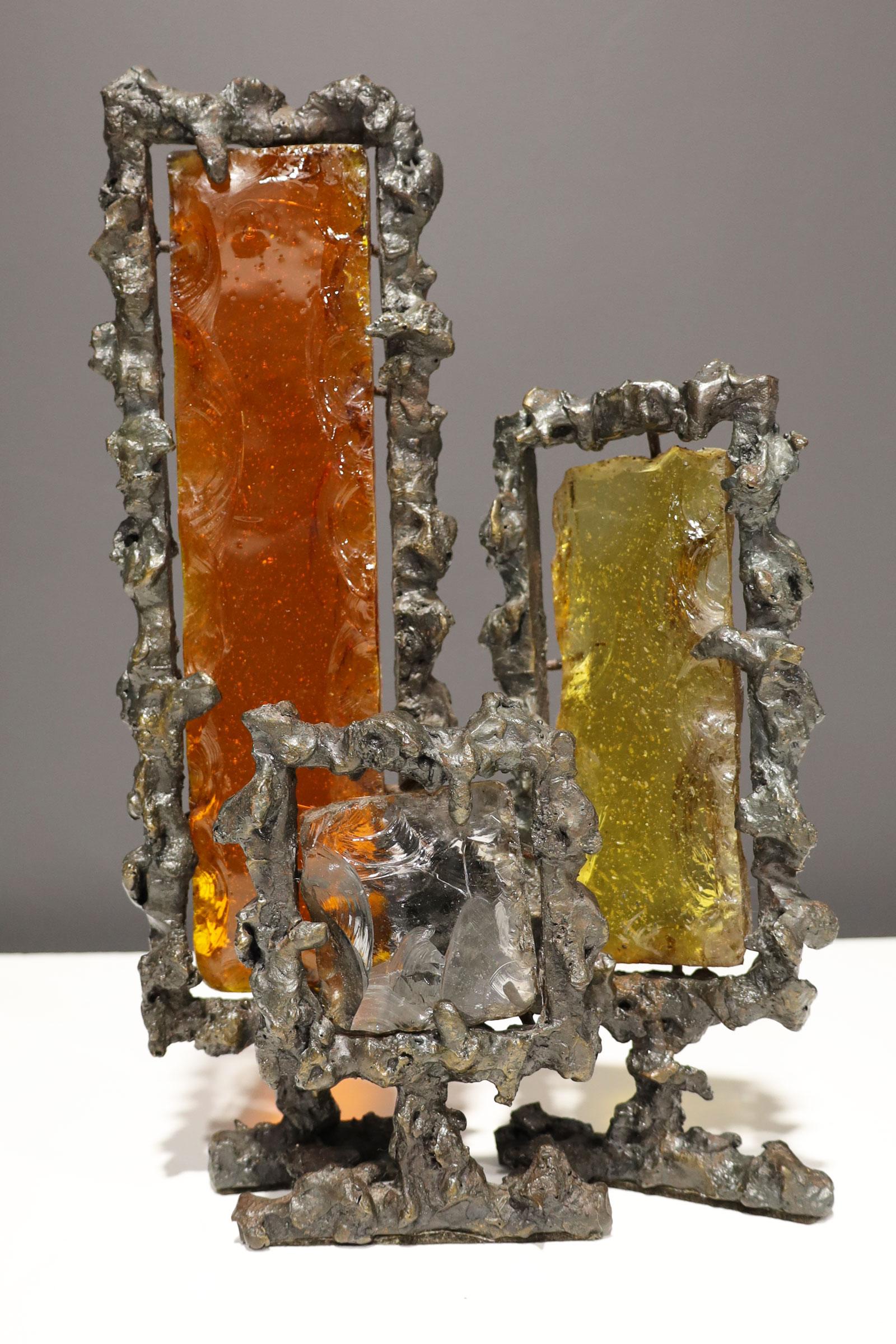 Mid-century Marcello Fantoni brutalist metal and colored glass sculpture. Stamped 