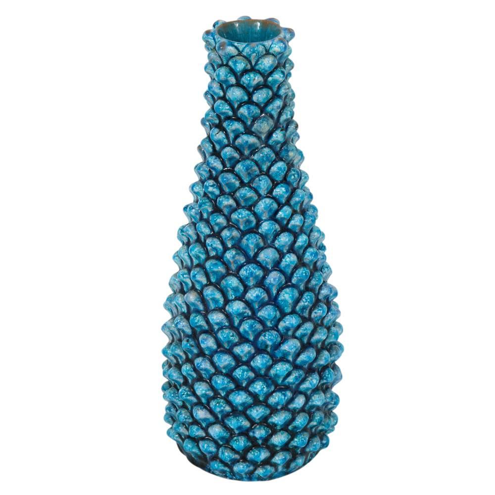 Fantoni vase, ceramic blue pinecone signed. Medium tall tapered vase with semi gloss glaze pinecone relief decoration. Signed on the underside: Fantoni Italy.