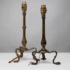 Faraday & Sons. A near pair of Arts & Crafts Pullman Coach brass table lights