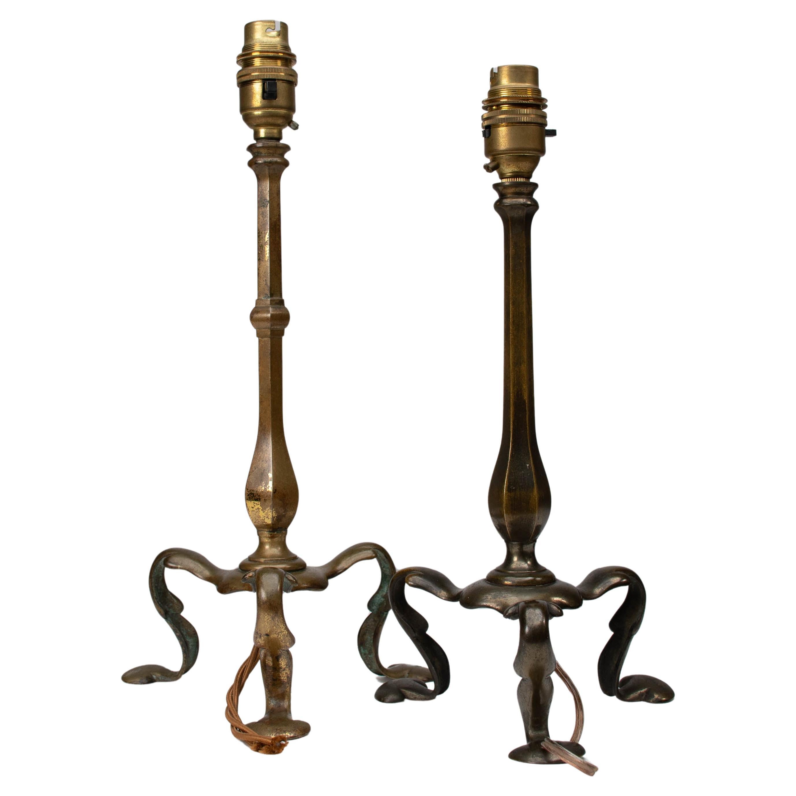 Faraday & Sons. A near pair of Arts & Crafts Pullman Coach brass table lights