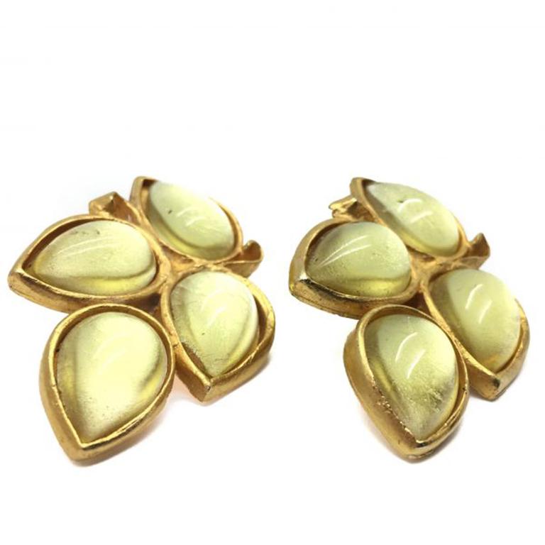 A sublime pair of Vintage Farah Lister Earrings. Made during the 1980s featuring 22ct gold plated metal set with iridescent lemon-lime tone glass teardrop cabochons. An prime example of the work of Farah Lister. Measuring approx. 5cm long and in