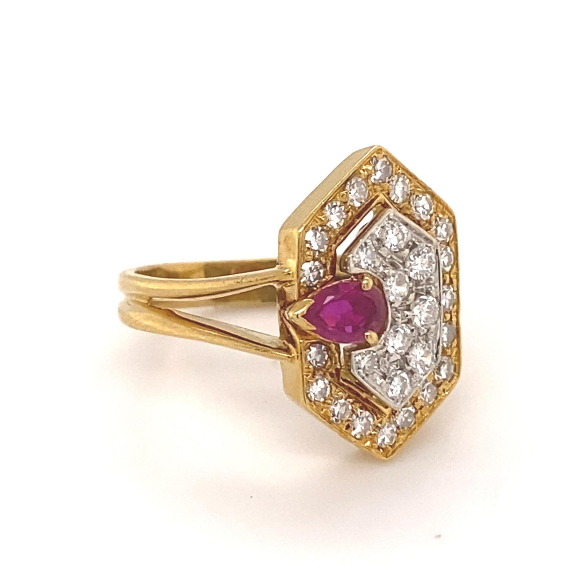 This is a beautiful Italian designer ring by Faraone Menella. The ring is set with diamonds and a ruby in 18K yellow and white gold. The 29 diamonds are white H-I color VS-2 clarity total weight .58 carats. The ruby is natural pear shaped with nice