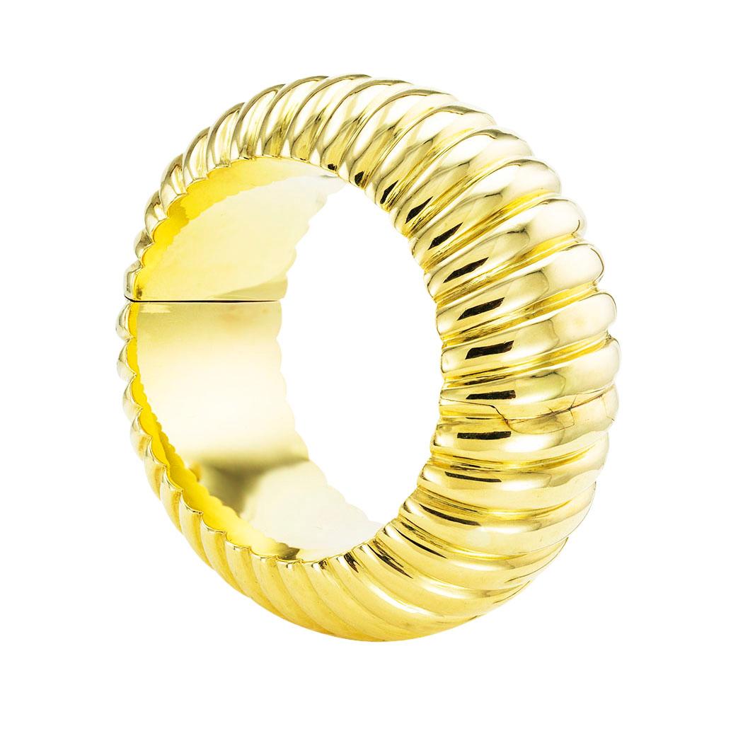 Faraone Mennella wide hinged gold bangle bracelet circa 2000 . *

ABOUT THIS ITEM:  #B1876 Scroll down for specifications.  Here is a large-scale and hefty gold bangle bracelet.  The design is bold and exquisitely crafted, a piece of jewelry that