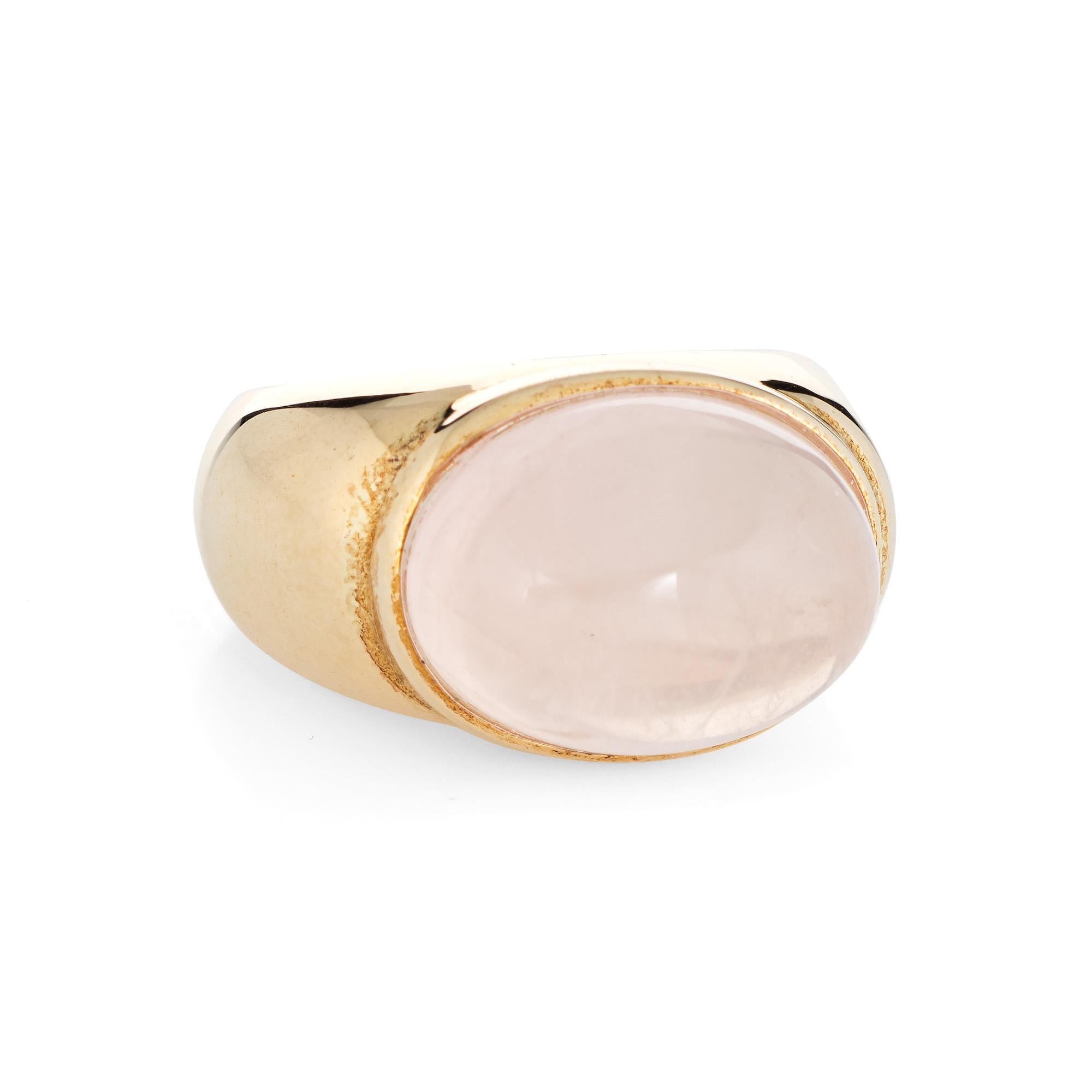 Stylish Faraone Mennella cocktail ring crafted in 14 karat yellow gold. 

Rose Quartz cabochon measures 16mm x 12mm (estimated at 12 carats). The rose quartz is in excellent condition and free of cracks or chips. 

The light pink hued rose quartz