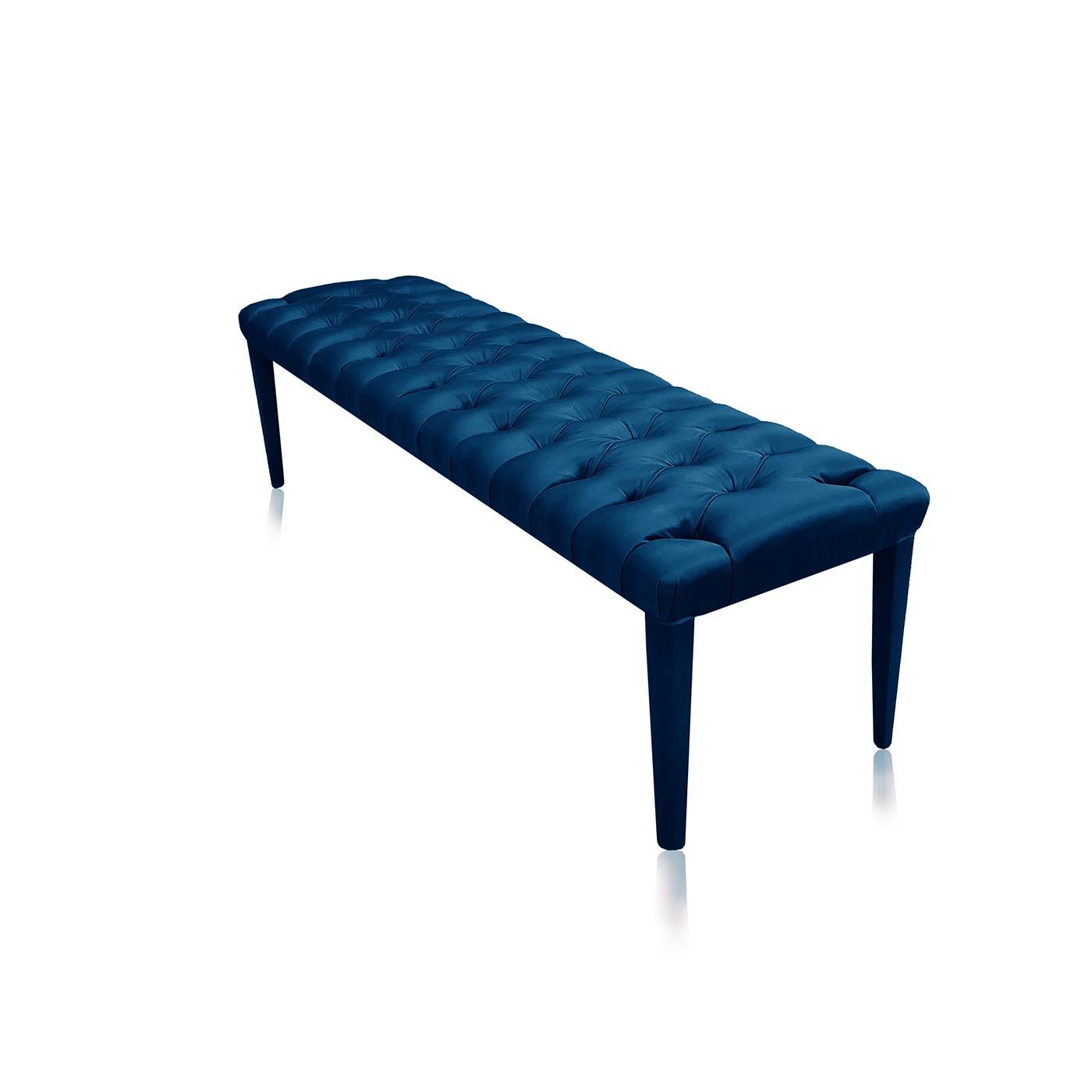 The Farfalla Ottoman Bench in Navy by Davide Barzaghi is firm, comfortable and exquisitely elegant. Fit for royalty, this ottoman bench features plush padding on top of a solid dried beech wood frame. Upholstered in a luxurious cotton satin, it is