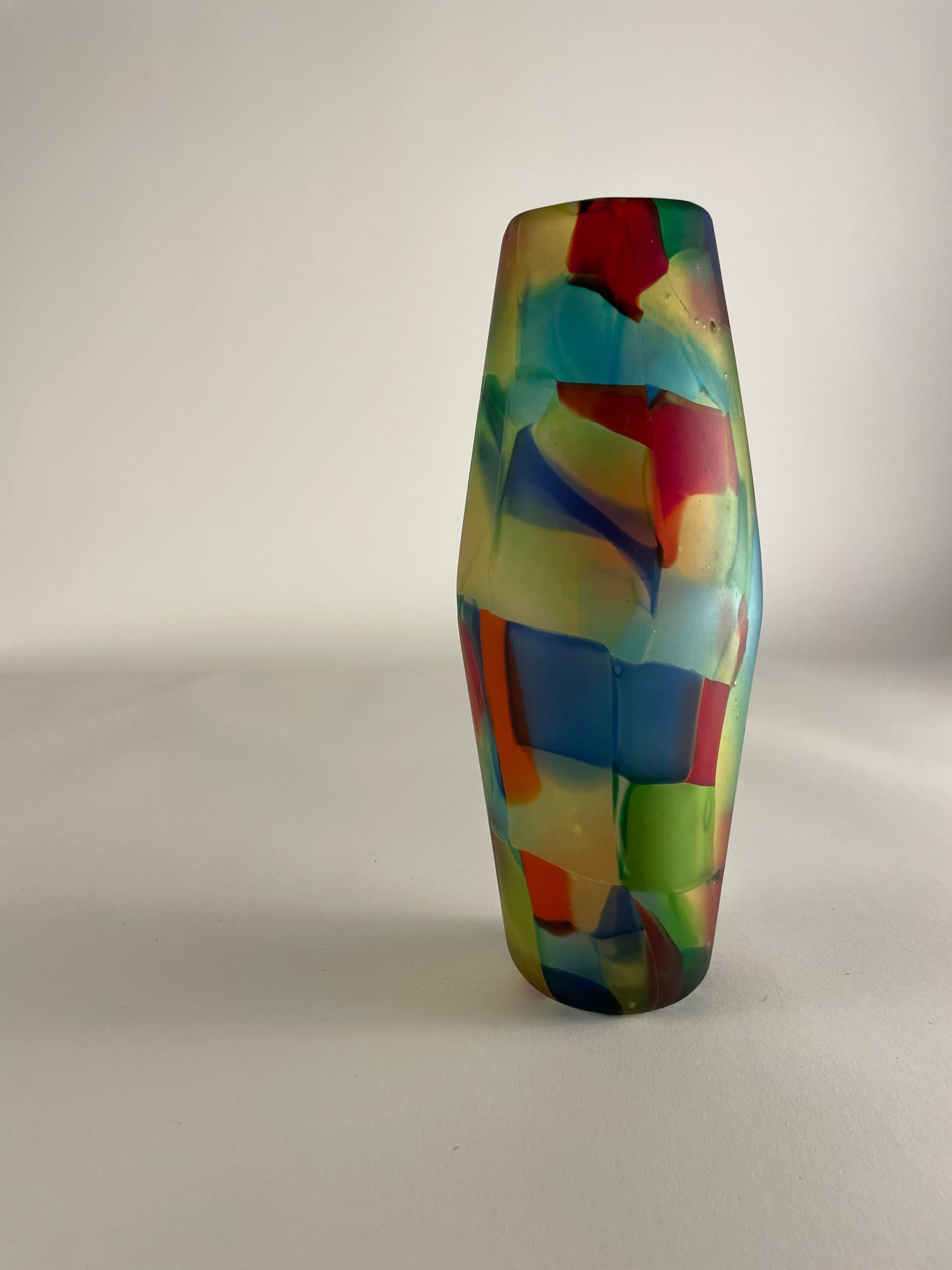Looking for an eclectic, artistic attitude to add to your home decor? Look no further than the Farfalle vase by Pollio Perelda for Fratelli Toso. This beautiful Murano glass piece is a reinterpretation of classic murrina style, updated for a more