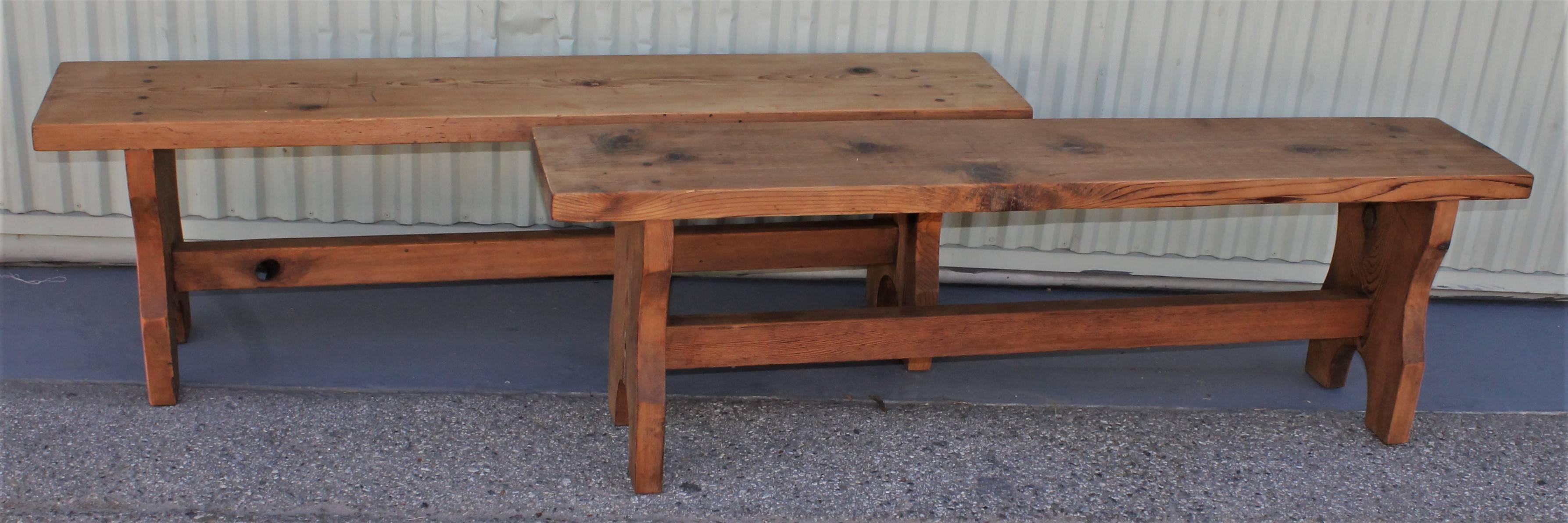 These pine Amish made farm house benches are in pristine condition and very strong and sturdy. They are perfect at a farm table for seating. Great natural surface with wood peg construction.