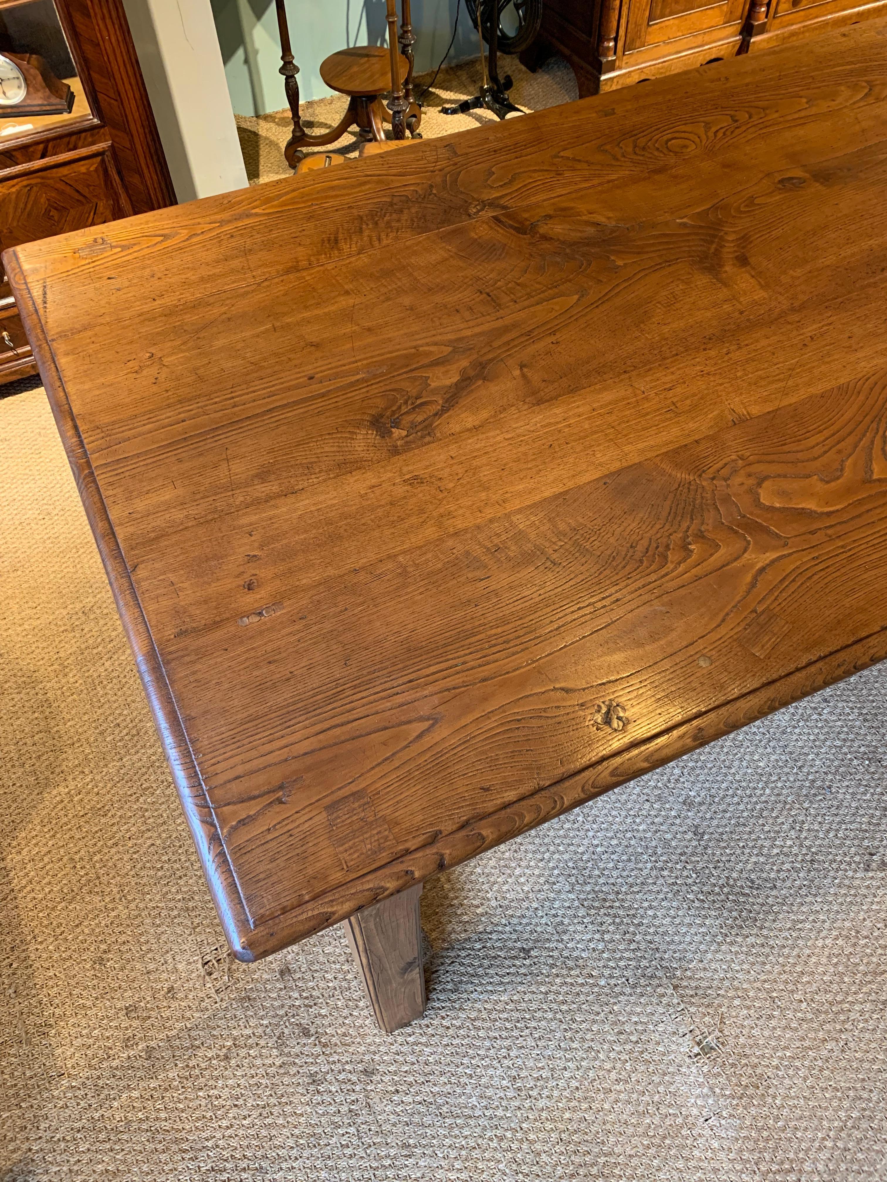 Great late 19th century elm farm table of unusually large proportions
at 42 inches wide and 122 inches long

French dating to circa 1880s this table will seat 12 plus people 2 drawers to one side

This piece has been through our workshops,