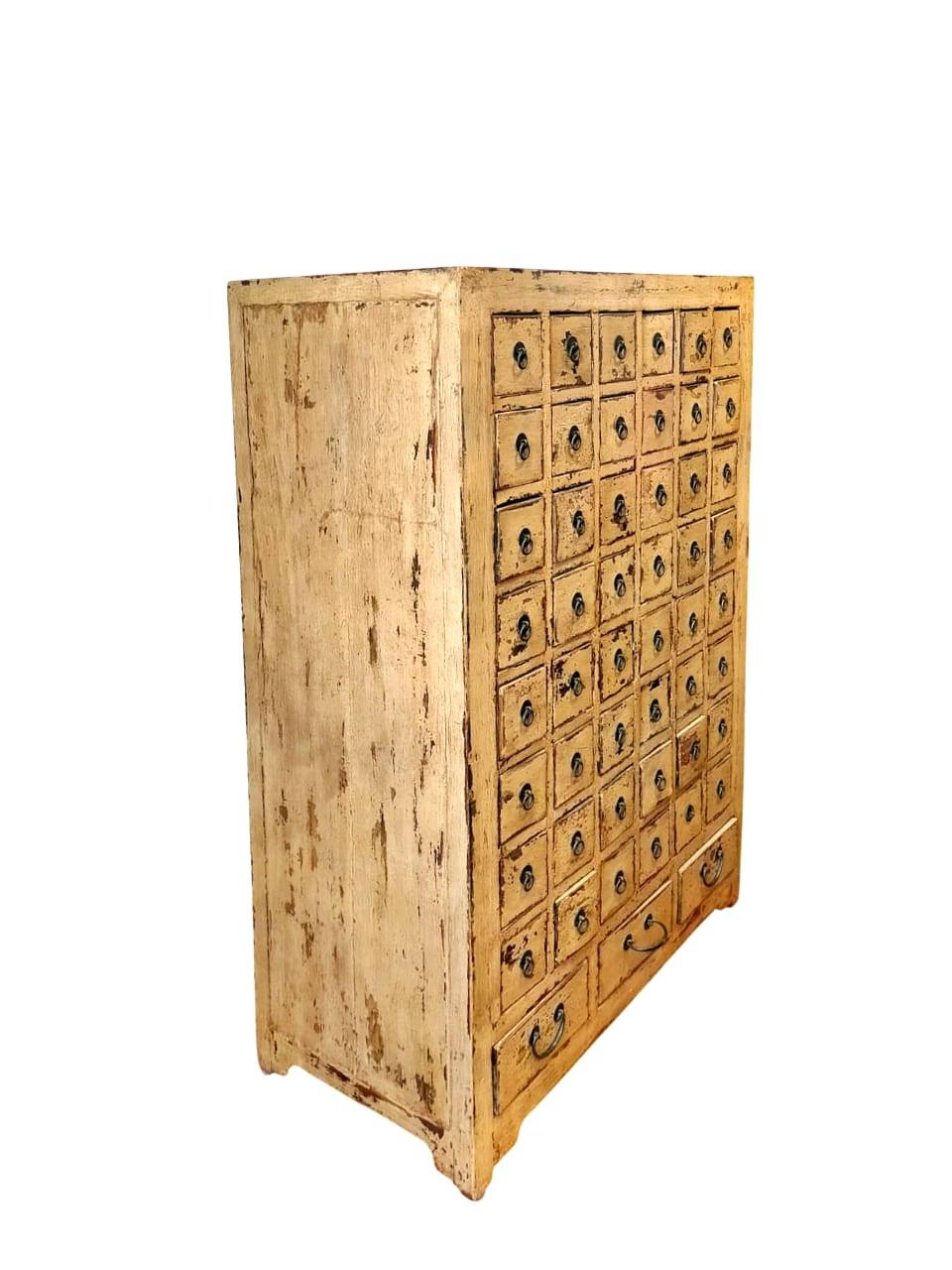 Ancient Traditional Pharmacy China
Traditional antique China elm pharmacy with its original ochre lacquer finish 
Each drawer has 4 internal compartments.
The cabinet is restored.
Era: late 1800s
Measurements: L. cm 87 - D. cm 45 - H. cm 126

For