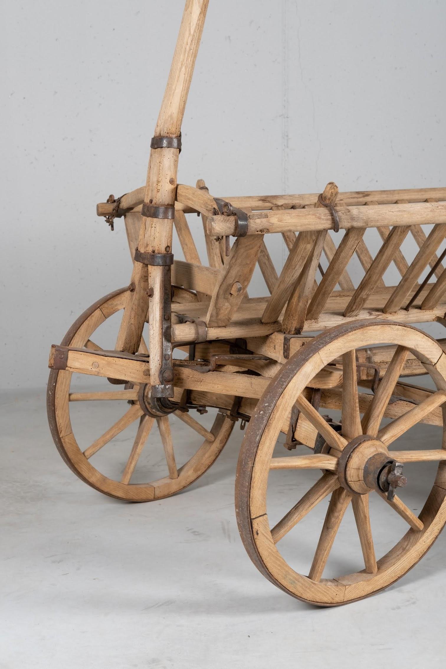 Farmer cart made in solid larch, ash, spruce, with all the original steel hardware.