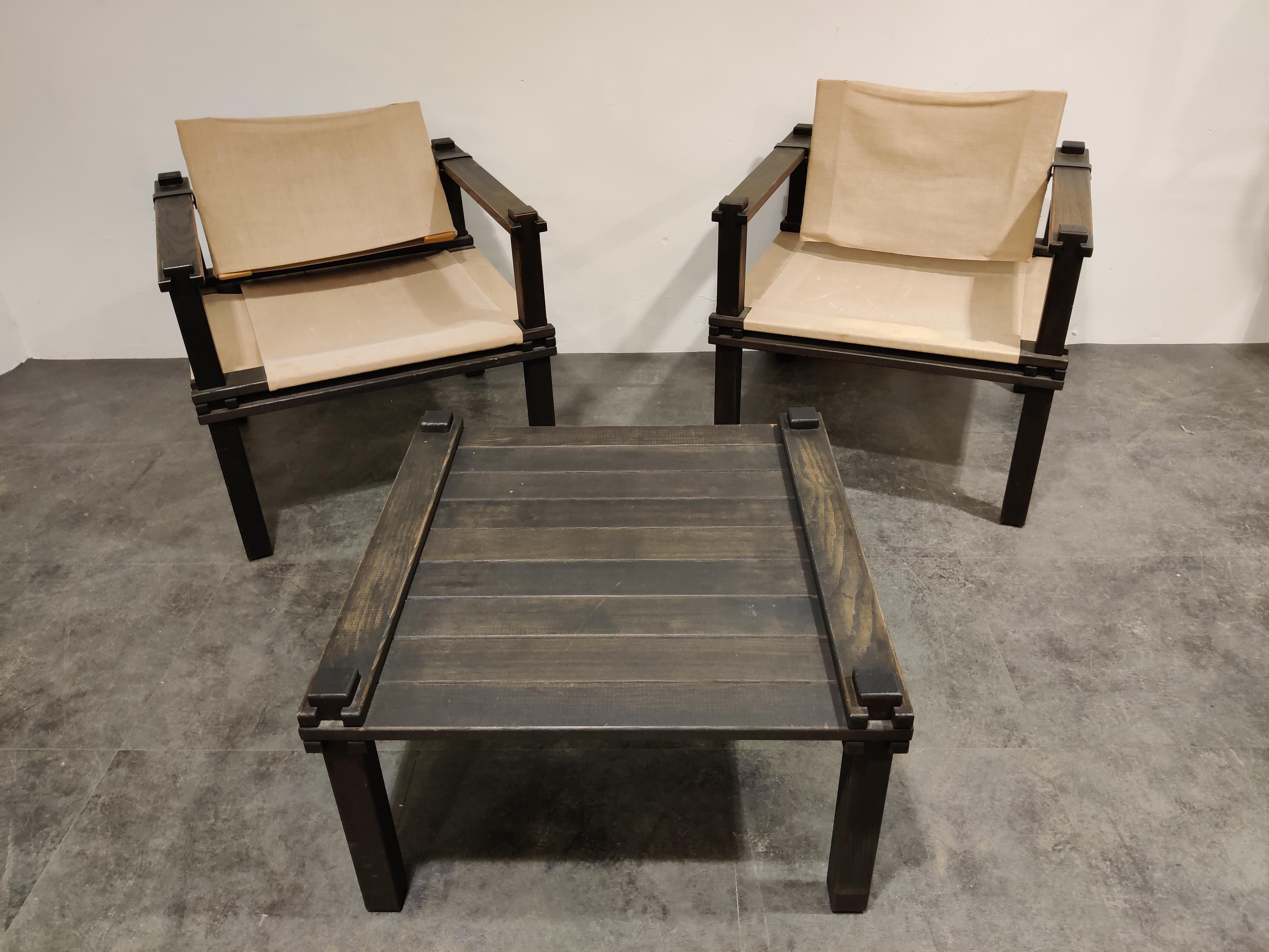Rare set of armchairs with table designed by Gerd Lange for Bofinger.

Great interlocking structure with moveable backrest. Fun fact is that only two screws are used to assemble the complete chair.

Even better is that the chairs come with their