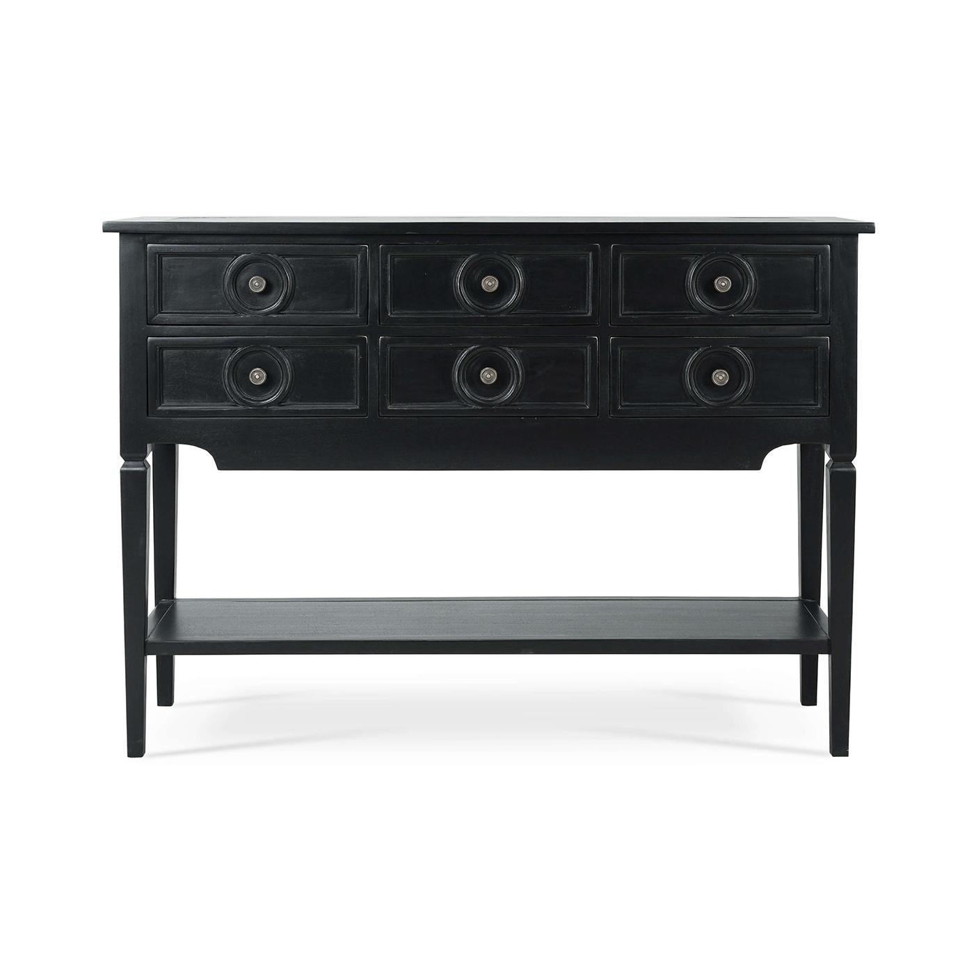 This stunning piece combines rustic European appeal with practical functionality, making it the perfect centerpiece for your dining or living room. The Batavia black painted finish and classic design elements create a cozy and inviting atmosphere in