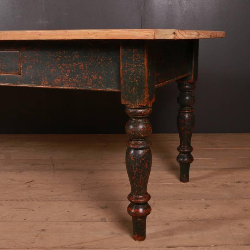 Early 19th century three-drawer farmhouse kitchen table. Two drawers in the side and one in the end 1820.

Clearance under the rail is 23