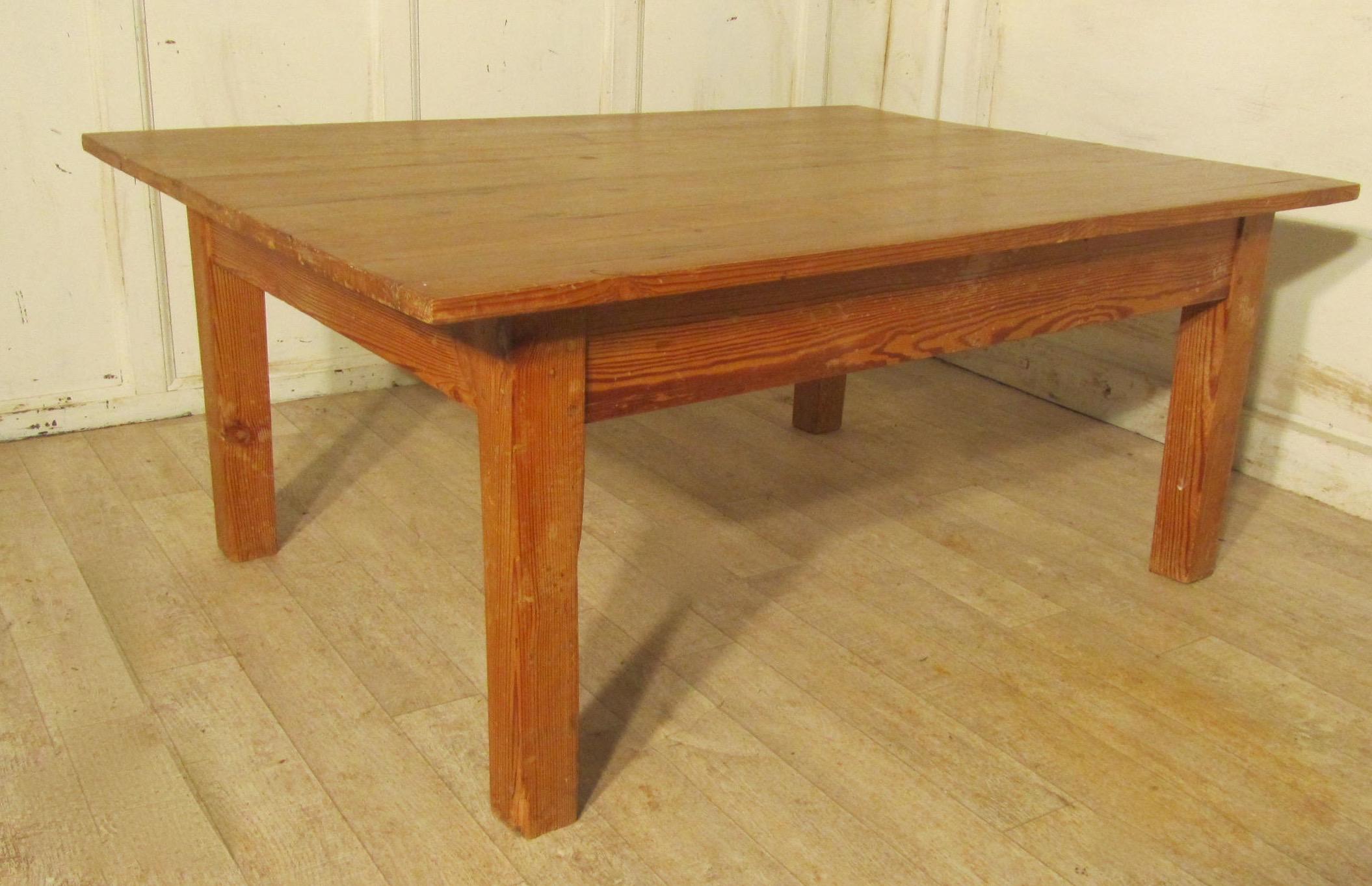 Farmhouse Style Chunky Pine Coffee Table

This is a traditional Kitchen table, the square legs have been lowered to make it into a Coffee Table
The table has a Pine Plank top, it is very sound and sturdy.

As to condition, this table is very sturdy,