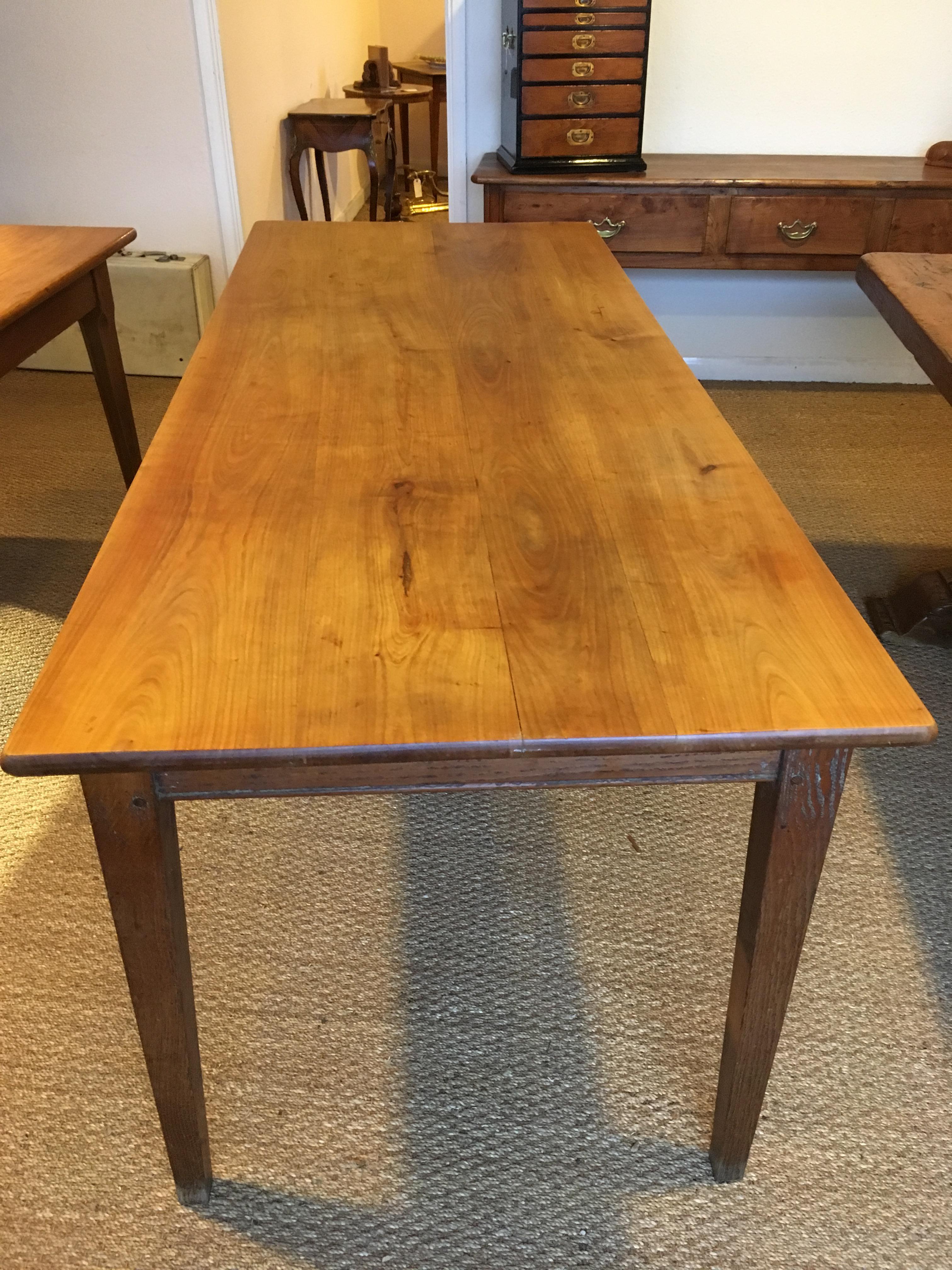 Early 20th century cherrywood and oak based farmhouse table

Dating to circa 1910 this table will seat 6-8 people 

All the joints are firm 

Measures: Height 30inches 
Width 31 inches 
length 77 inches.

Good height under the rail 25.5