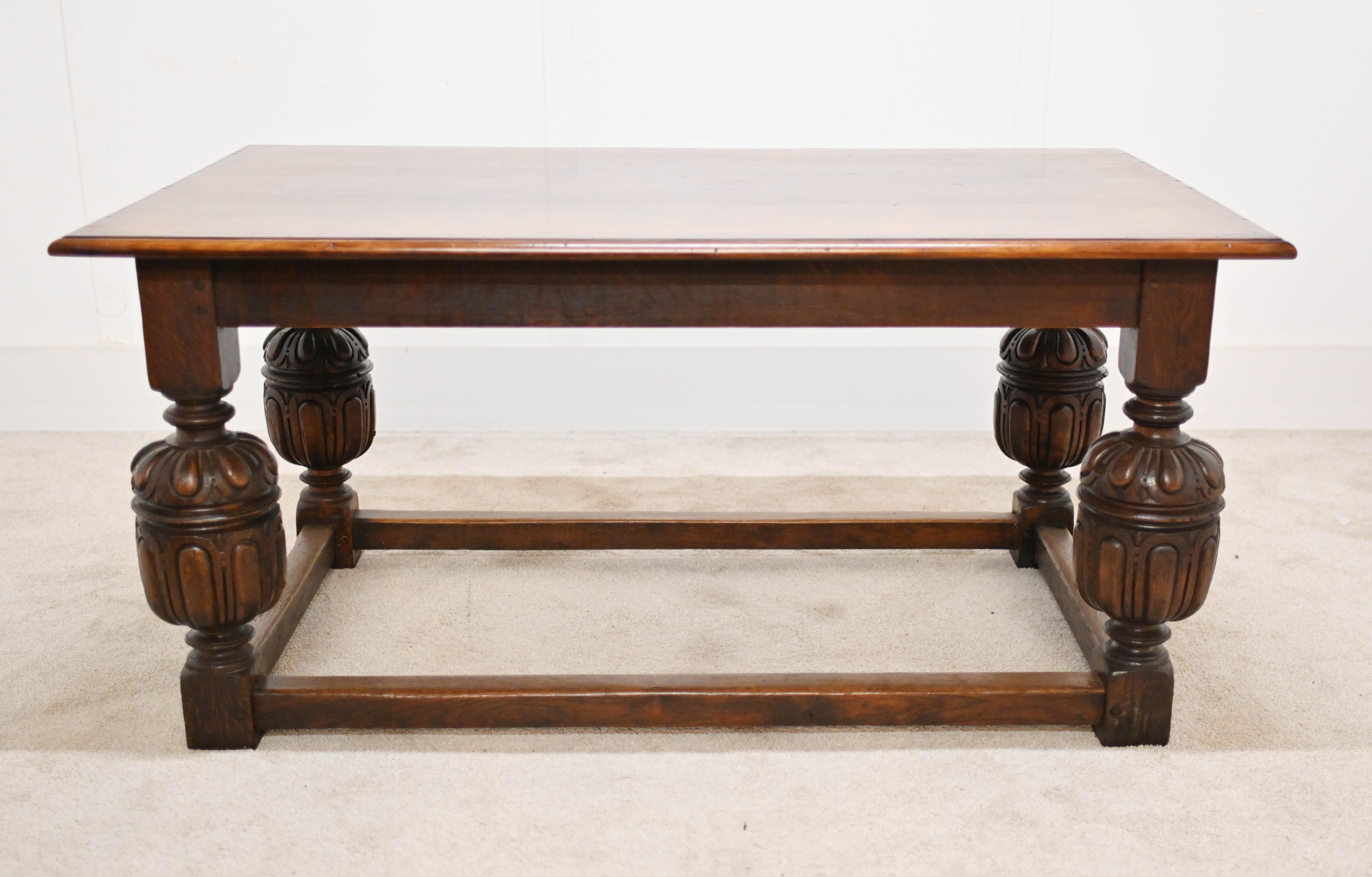 Oak Tudor style centre/serving table with carved bulbous legs 
Could almost function as a small refectory table also
Great farmhouse look with the oak and detailed carving
Circa 1880
Offered in great condition ready for home use right away
Will ship