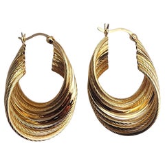 Orecchino a cerchio a strati in oro giallo Faro 14K #23861