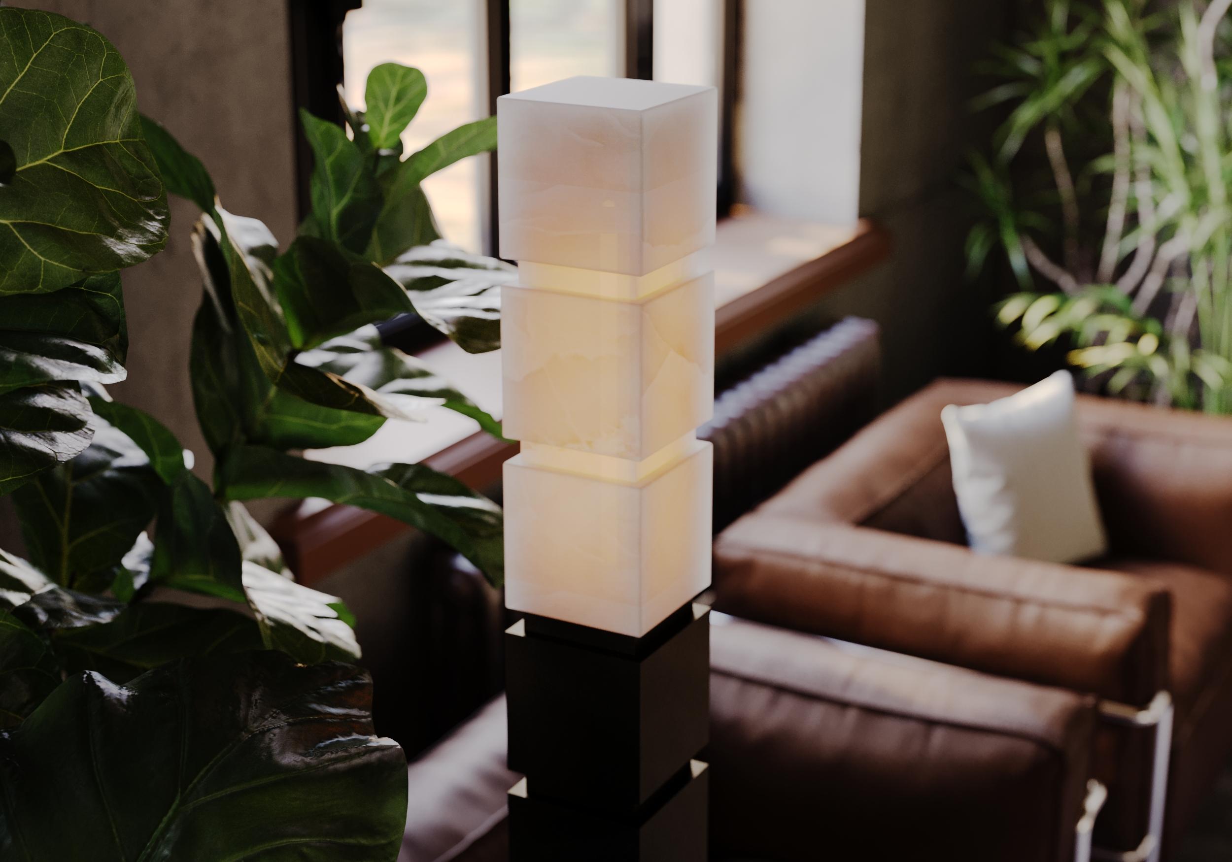 A totem of carved natural alabaster atop solid cast oil rubbed bronze torchiere.


Models in the collection are individually hand-crafted by the skilled artisans in our studio. Custom versions tailored to a specific setting are available by