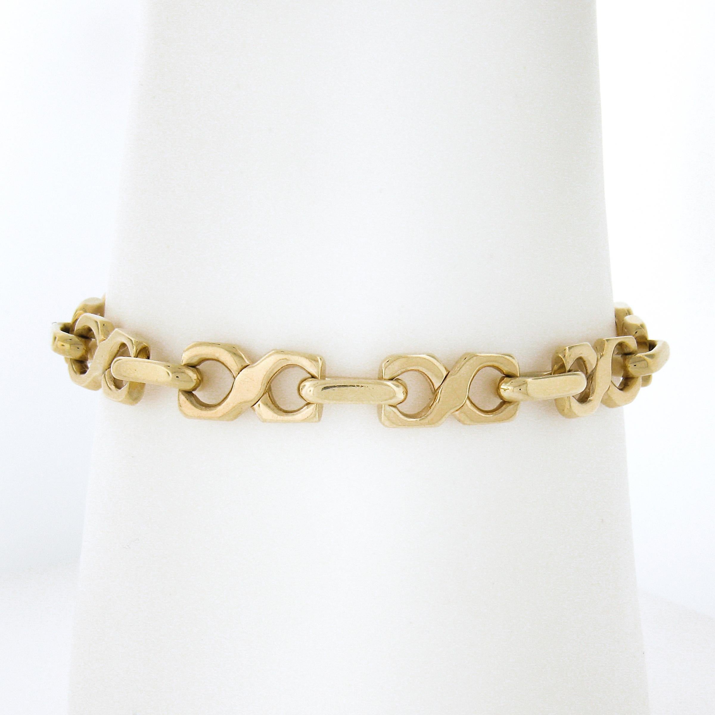 Material: Solid 14k Yellow Gold
Weight: 23.26 Grams
Chain Type: Alternated Figure 8 & Open Oval Link
Chain Length:	Will fit up to a 6.5 inch wrist (fitted on a wrist)
Clasp: Lobster Claw
Width: 7.2mm (at the figure 8 link)
Thickness: 5.5mm rise off