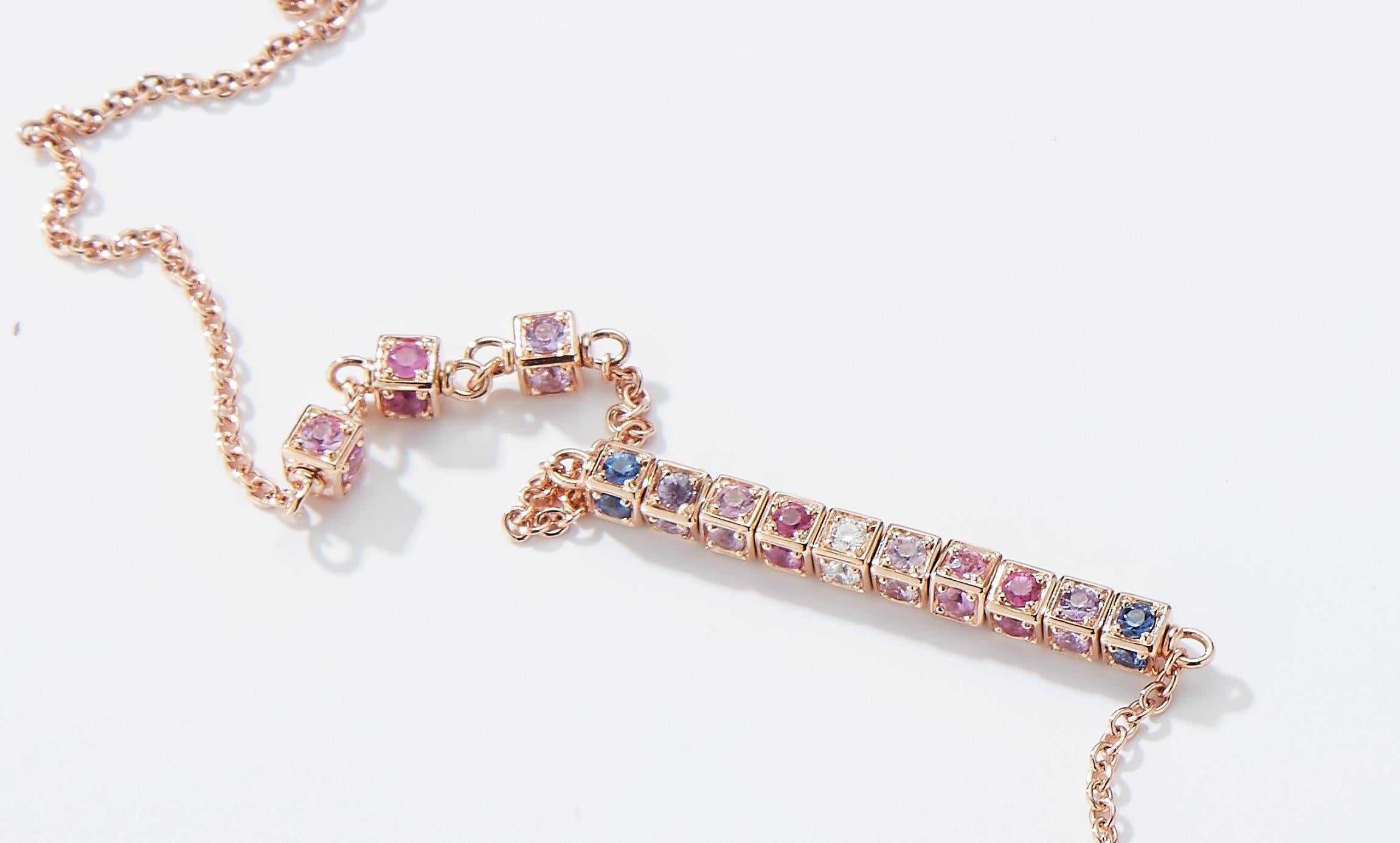 Faro long necklace in 18K rose gold with rotating cube elements set with multi colored sapphires (approx. 12.04 carats) and white diamonds (approx. 0.80 carats)
