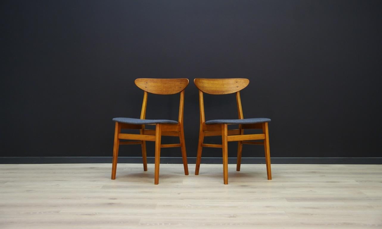 Set of two chairs from the 1960s-1970s, a minimalistic form straight from the Farstrup Møbler manufacture. The structure is covered with teak veneer. Upholstery after replacement (color - grey). Preserved in good condition (minor scratches on wooden