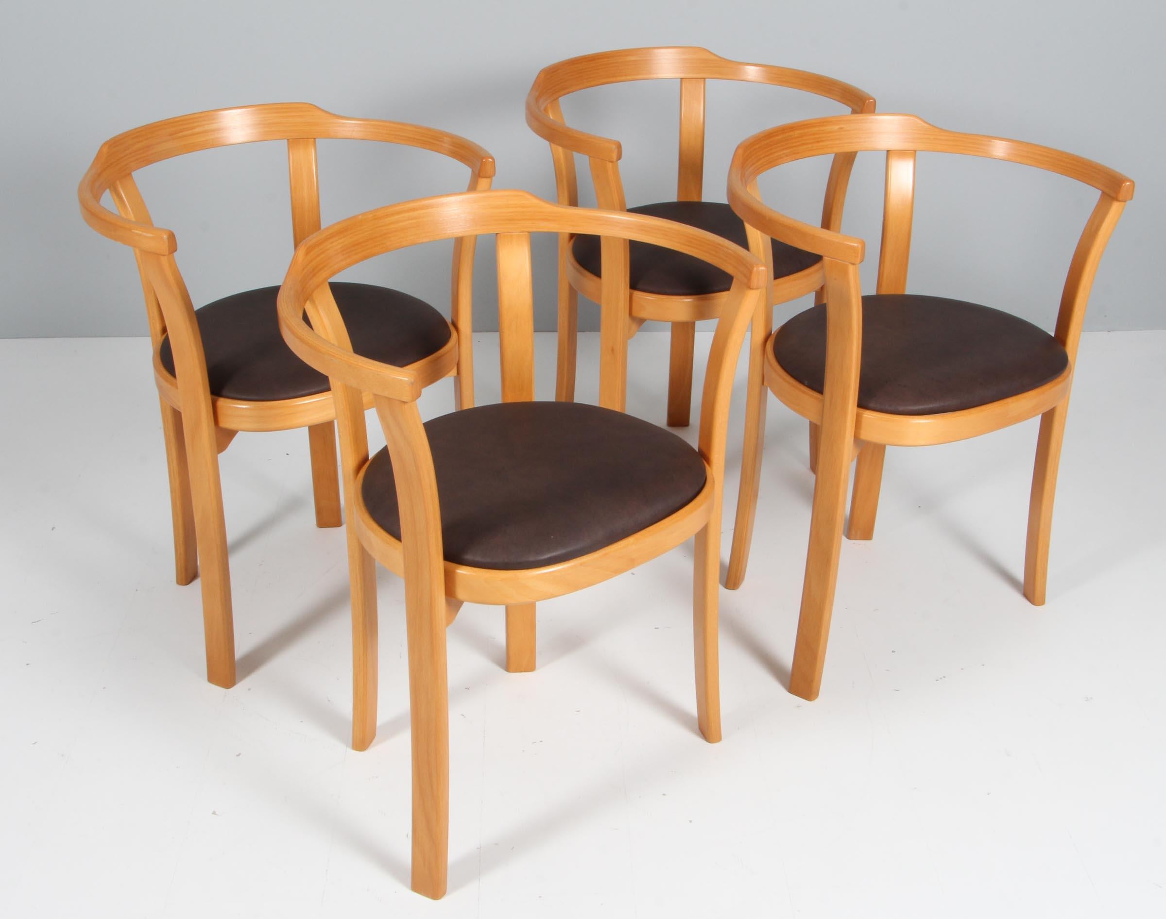 Farstrup set of four armchairs, lacquered beech

Upholstered with mokka latina leather.

Made by Farstrup.