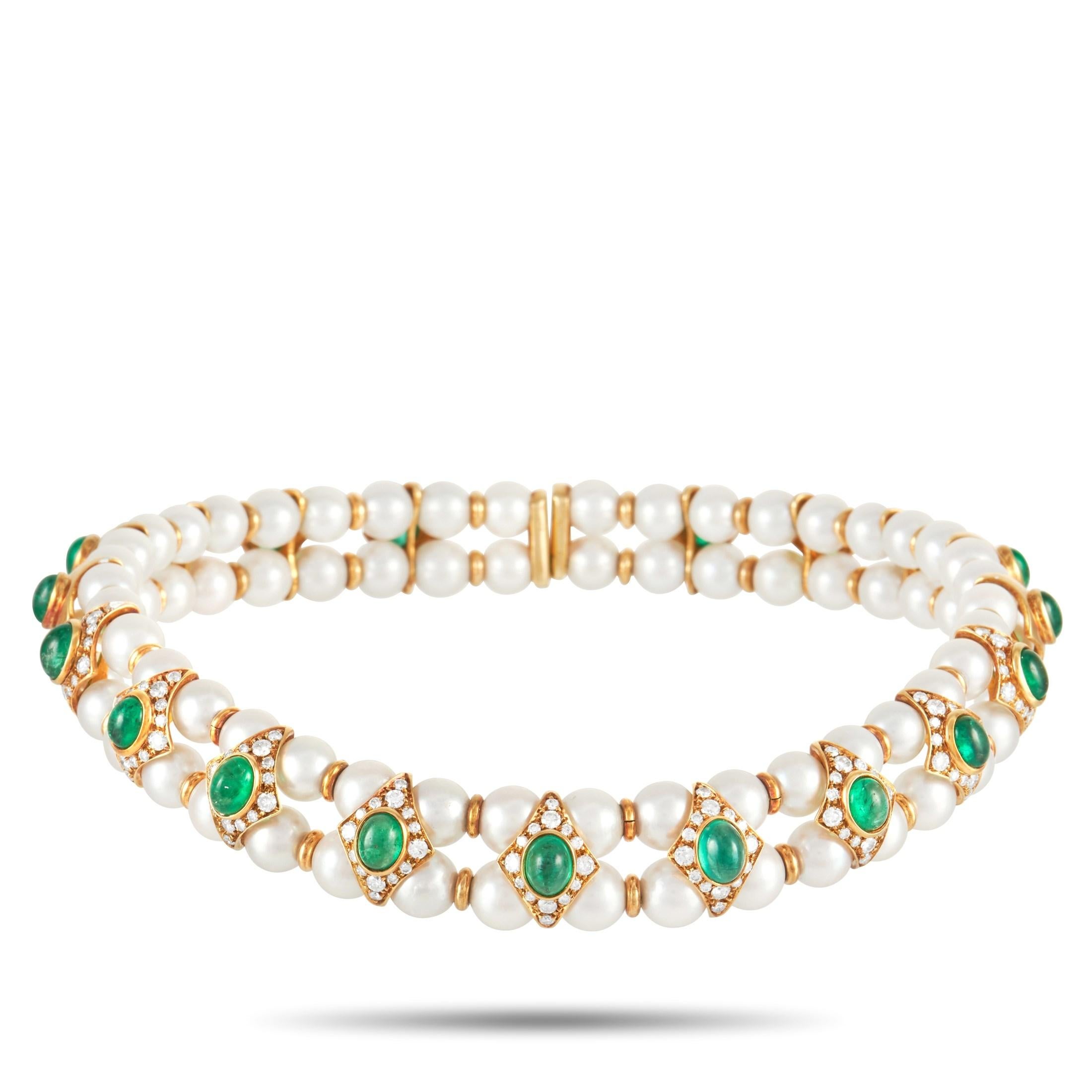 This Fasano choker necklace is fit for modern royalty. It’s comprised of two bands featuring white beadwork set within a deep 18K Yellow Gold setting. Diamond-shaped accents come to life thanks to oval-shaped emeralds totaling 18 carats, which are