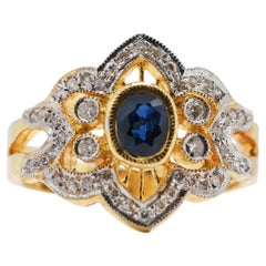 Faszinierender Ring aus 18 Karat Gelbgold mit 0,43 Karat blauem Saphir und Diamanten