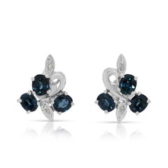 Fascinating 0.62ct Sapphire
Diamond Floral Earrings in 14K White Gold