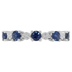 Fascinating 0.7ct Round Brilliant Sapphire Ring in 18K White Gold