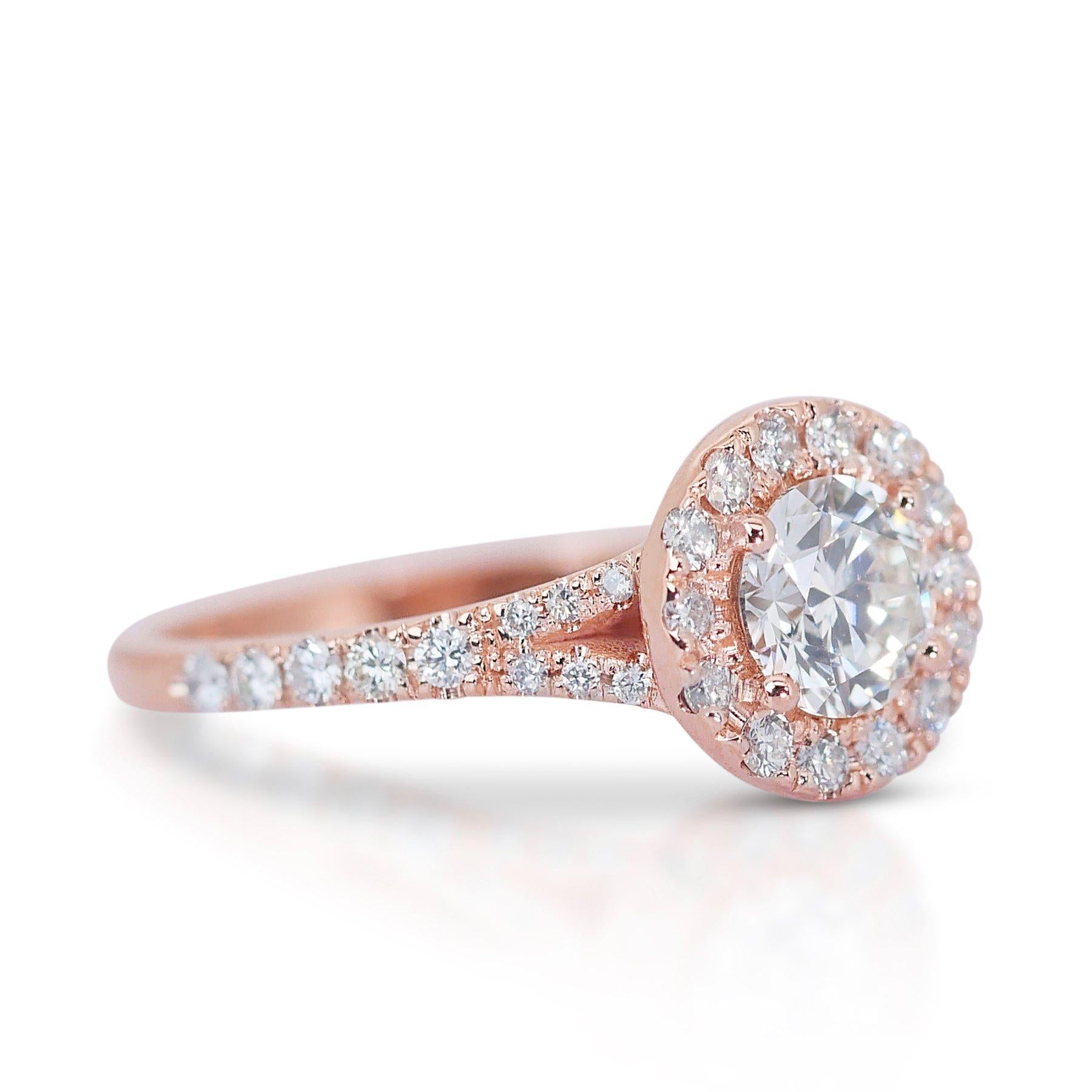 Fascinating 1.11ct Triple Excellent Ideal Cut Diamonds Halo Ring in 18k Rose Gold - GIA Certified

Unveil timeless elegance with this exquisite halo ring, featuring a 0.70-carat round diamond, expertly cut to triple excellent standards. Set in