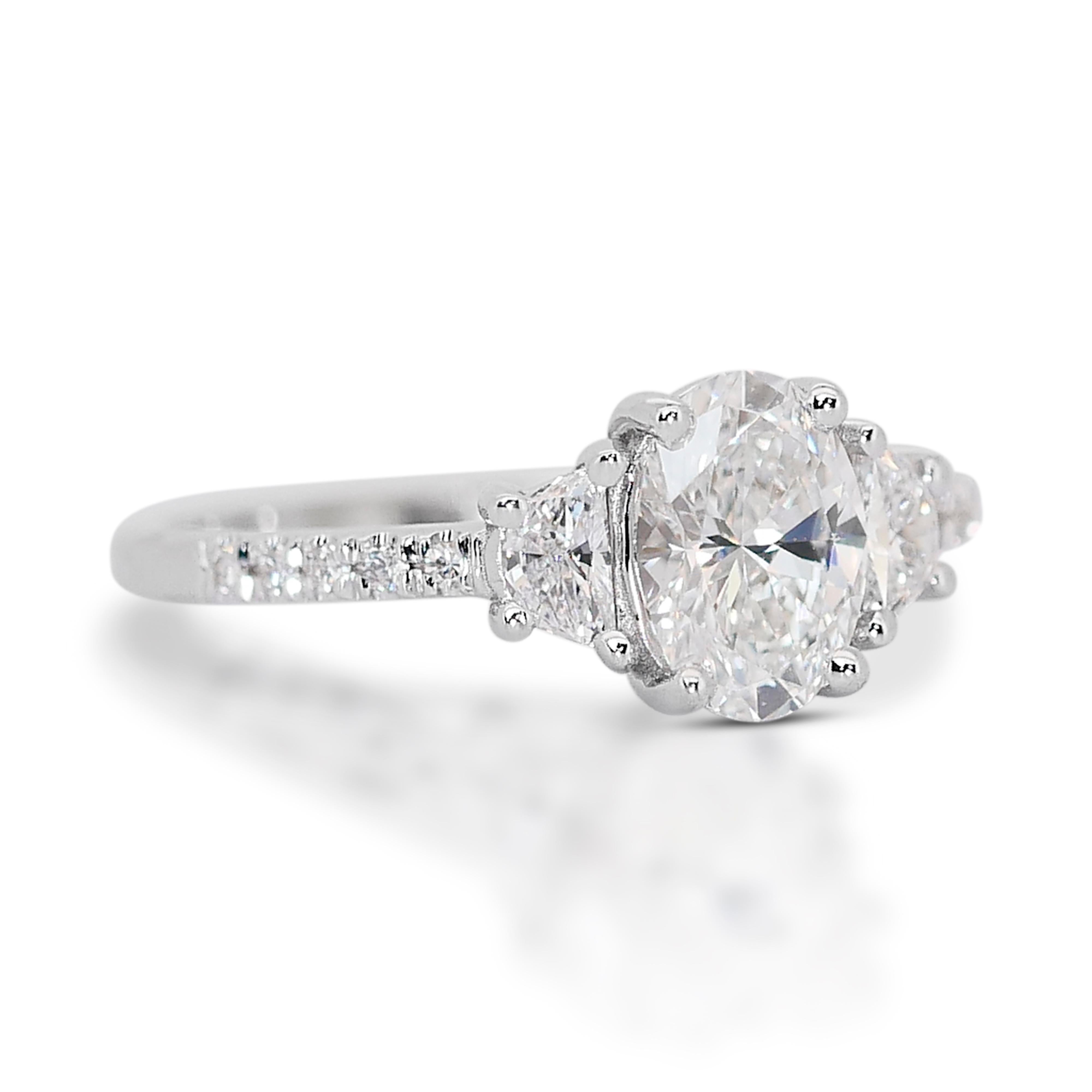 Whiting - Bague 3 pierres en or blanc 18k avec 1,32ct de diamants - Certifiée GIA

Découvrez l'élégance intemporelle de cette magnifique bague à trois pierres diamantées, méticuleusement réalisée en or blanc 18 carats lumineux. La pièce maîtresse