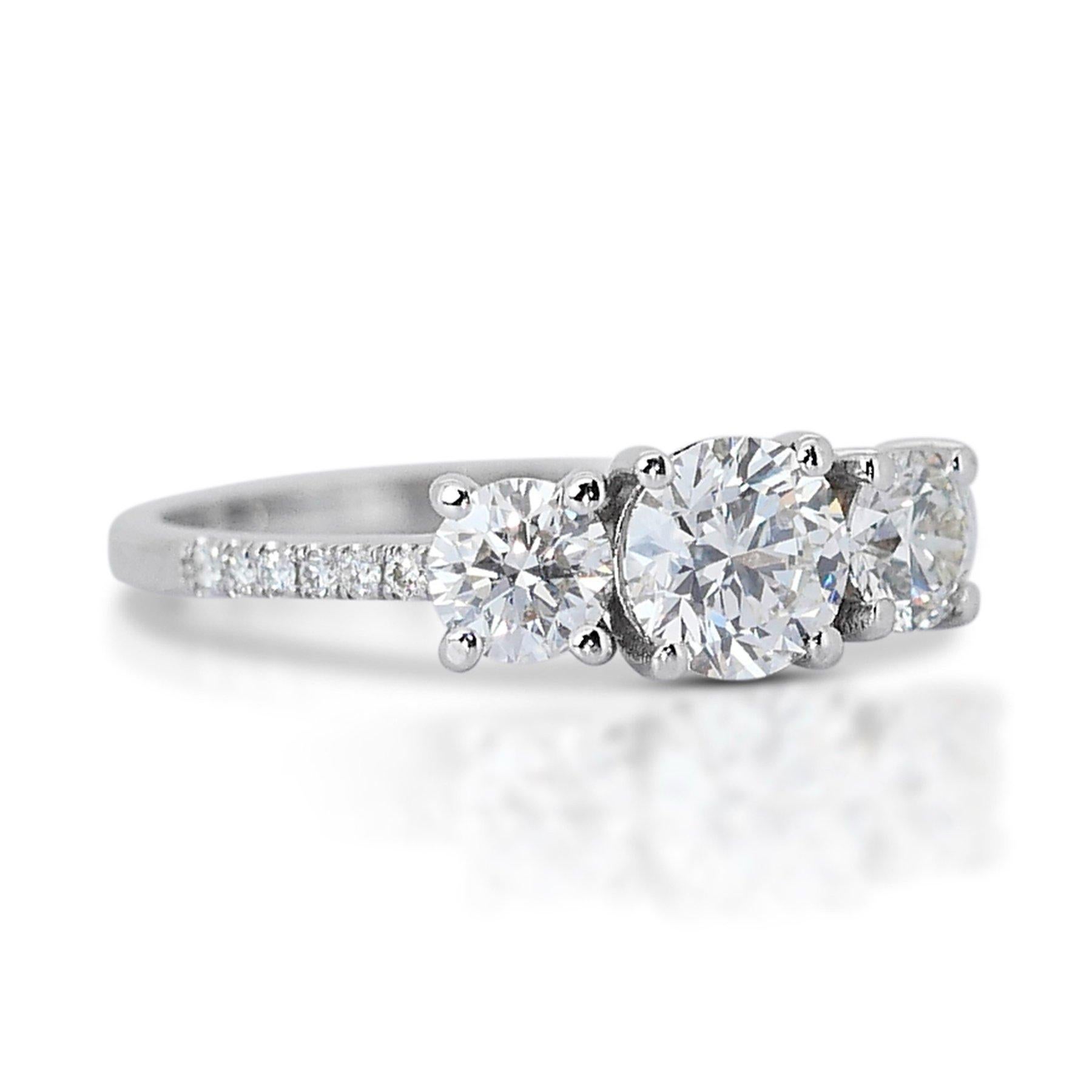 Fascinating 1.63ct Triple Excellent Ideal Cut Diamonds 3-Stone Ring in 18k White Gold - GIA Certified

Immerse yourself in timeless elegance with this stunning 18k white gold diamond 3-stone ring. The centerpiece features 3 exquisite diamonds,