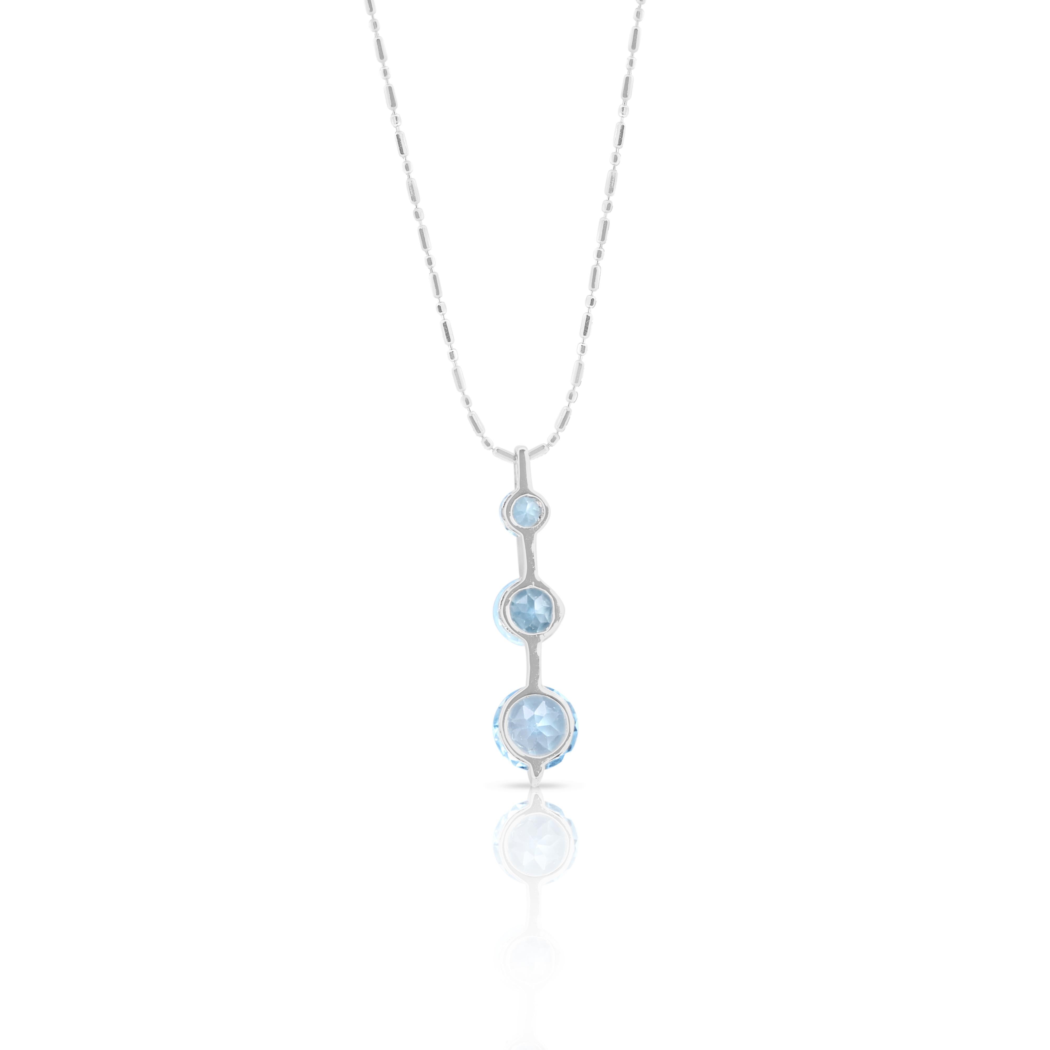 Fascinating 1.6ct Light Blue Topaz Necklace in 18K White Gold For Sale 1