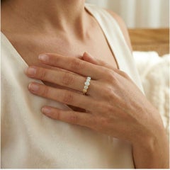 Fascinating 1.78g Opal Cabochon Five-Stone Band in 9K Yellow Gold
